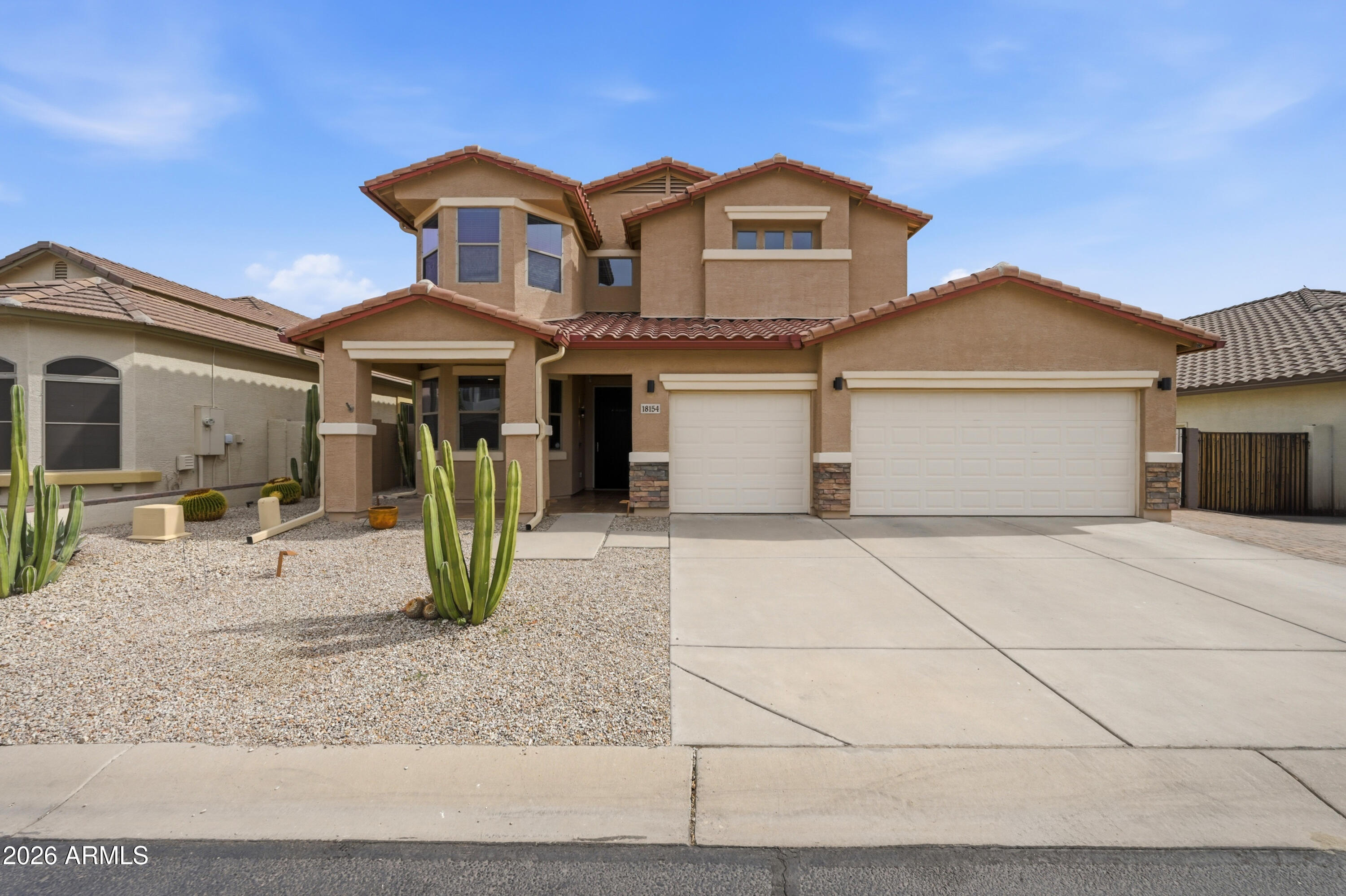 MUST SEE! Beautiful 2-story home in Gold Canyon with stunning mountain views & low-maintenance landscaping! Features include 2 new Trane A/C units, new water heater, under-sink RO, whole house water softener, LED lighting throughout, & fresh interior paint. Upgraded kitchen with quartz countertops, pullout cabinets, & custom finishes. Spacious layout with porcelain tile throughout, updated primary ensuite w/ walk-in shower, custom office cabinetry, & ceiling fans in every room. Backyard built for entertaining with 5ft play pool, rebuilt pump, ramada/pergola, gas fire pit, outdoor kitchen with limestone counters, & paver patio. 4-car tandem garage w/ workshop & mini split, cabinets, 220 outlet, RV gate, and ample parking. Close to hiking, atv trails & Desert Wells Recreation Area!