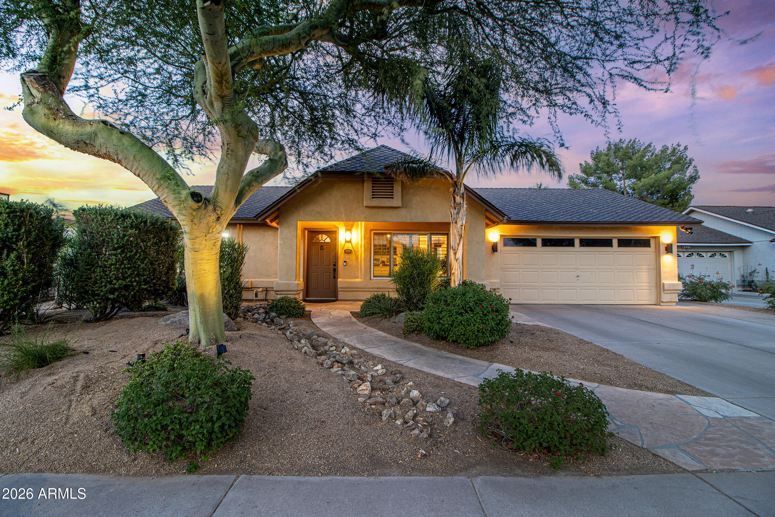 Looking for an immaculate home in Chandler on a cul-de-sac? You will love this 1700 sq ft 4 bedroom 2 bathroom home on a beautiful 8394 sq ft lot. This split bedroom floor plan includes ceramic wood plank tile in the kitchen, pantry, and living room in addition to having brand new carpet (and thick pad) in the 4 bedrooms. Every window in the home has been upgraded to dual pane and with white shutters on them. The kitchen has an open layout with granite countertops and two Velux skylights for natural light. When you see the backyard you'll flip your lid for the beautiful landscaping (including citrus trees), pool, pond, and wood burning fireplace. You will be in a desert oasis tucked away from the world for when you want to relax. The easy to access RV gate can actually be utilized since there is no HOA. Every detail of this home shows pride of ownership, don't wait until it's gone.