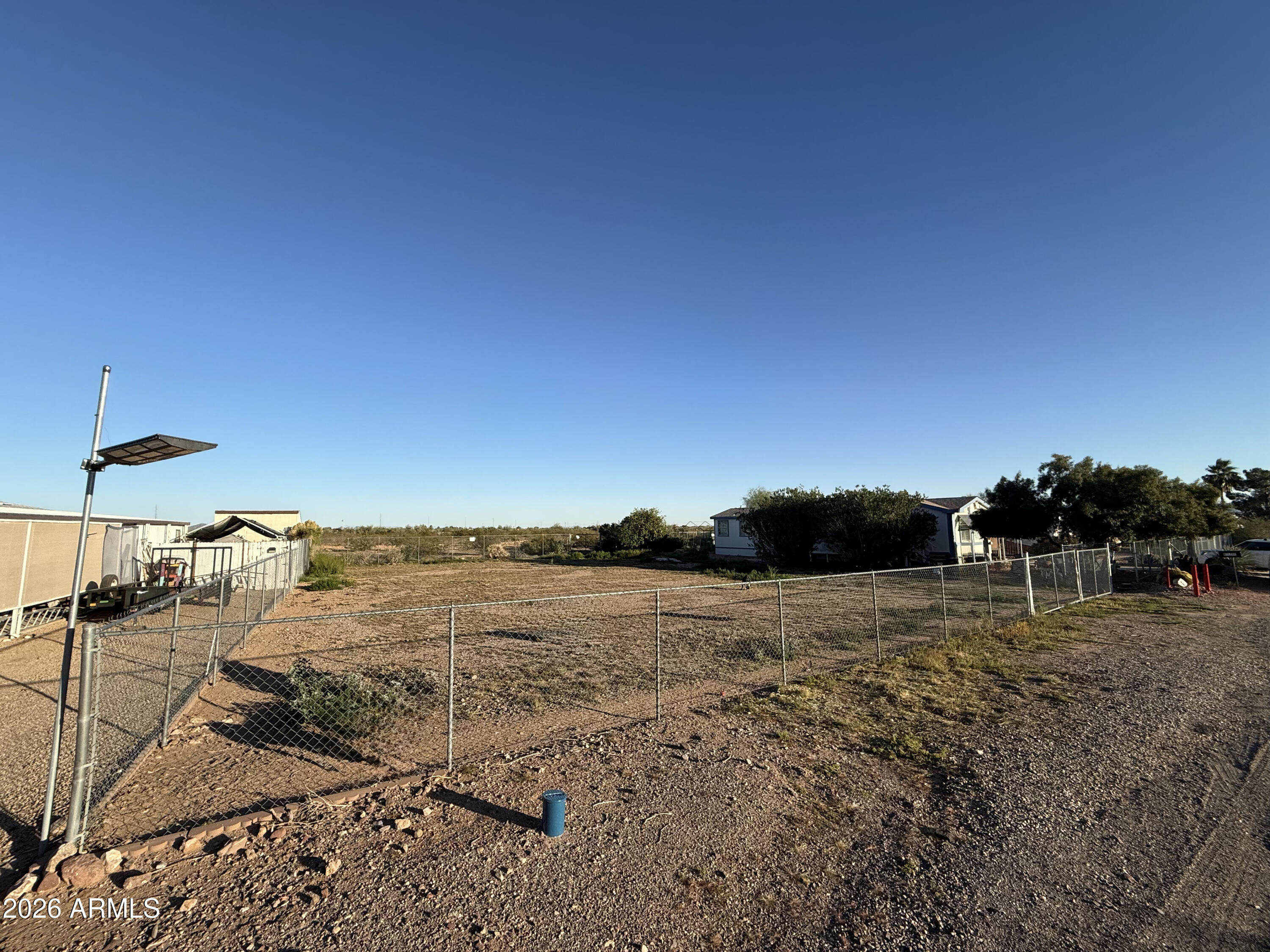 Includes chain link fencing with 2 RV gates.  Seller to complete chain link fencing between lots 24 and 25 with full price offer.  

$100 per year for road maintenance

Owner will carry with $30k down at 5% interest for 24 months.