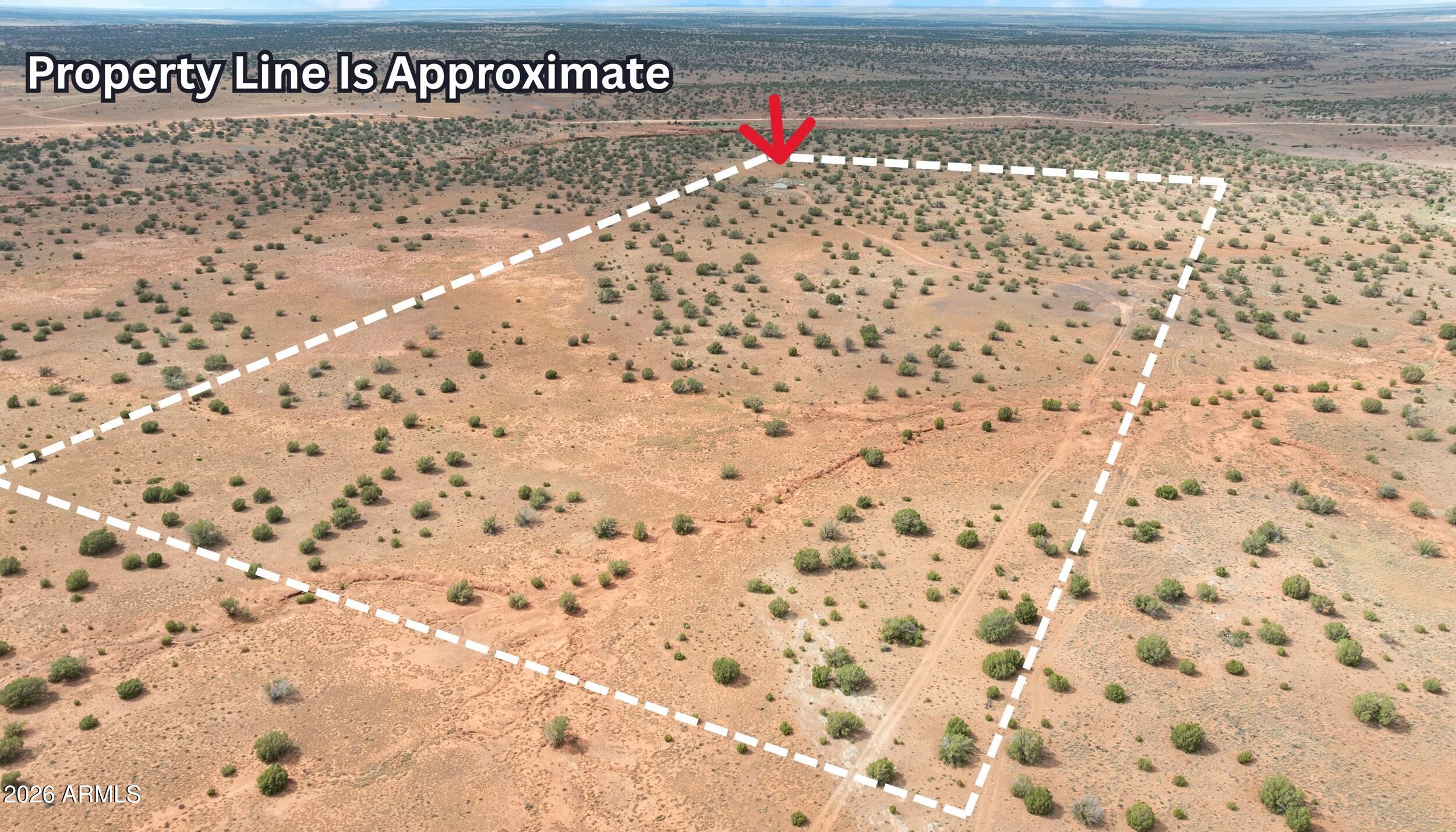 36+ Acres, Private Well, Electric Service, and Mountain Views. Escape to the peaceful unincorporated community of Concho, Arizona, where breathtaking mountain views and wide-open spaces create the perfect setting for your rural lifestyle. This exceptional 36-acre property offers endless possibilities, whether you're searching for a private country retreat, a working homestead, an equestrian property, or room to expand. The well-maintained Schult manufactured home features 3 bedrooms, 2 bathrooms, and a warm, inviting floor plan designed for comfortable living. Inside, you'll find vaulted ceilings throughout, a cozy wood-burning fireplace, an eat-in kitchen with a walk-in pantry, skylights that fill the home with natural light, and spacious walk-in closets in all three bedrooms. Built with quality in mind, the home offers durable 2x6 exterior wall construction and energy-efficient Low-E dual-pane windows for year-round comfort.

Outside, the possibilities are endless. The expansive acreage provides ample room for livestock, horses, farming, gardening, recreational activities, or future outbuildings. Experience the serenity and privacy of country living giving you the peaceful feeling of being off the grid without sacrificing modern conveniences.

If you've been dreaming of wide-open spaces, stunning scenery, and the freedom to create the lifestyle you've always wanted, this one-of-a-kind property is ready to welcome you home.