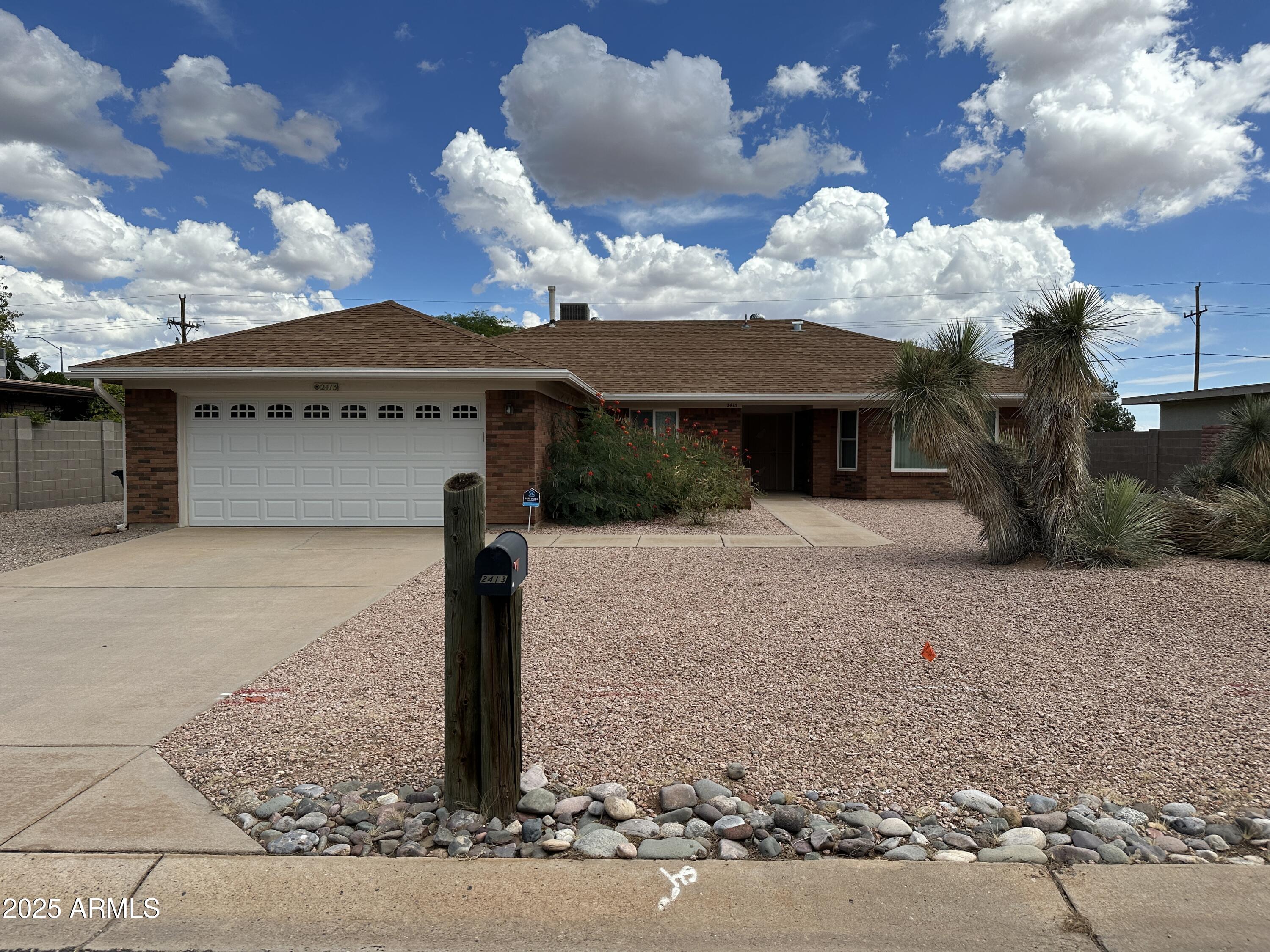 This charming 3bed/2bath/1888 sf home offers an inviting open floor plan with spacious living areas, abundant natural light, and stunning views of the Mule Mountains. The kitchen features custom counter finish, and a great counter peninsula for everyday living or entertaining. A cozy fireplace, split floor plan, and generous bedrooms add comfort and privacy. Step outside to a large backyard with a covered patio—ideal for gatherings or relaxing desert evenings. Located in the desirable Country Club Estates neighborhood, you'll enjoy quiet surroundings close to shopping, dining, schools, and Fort Huachuca.