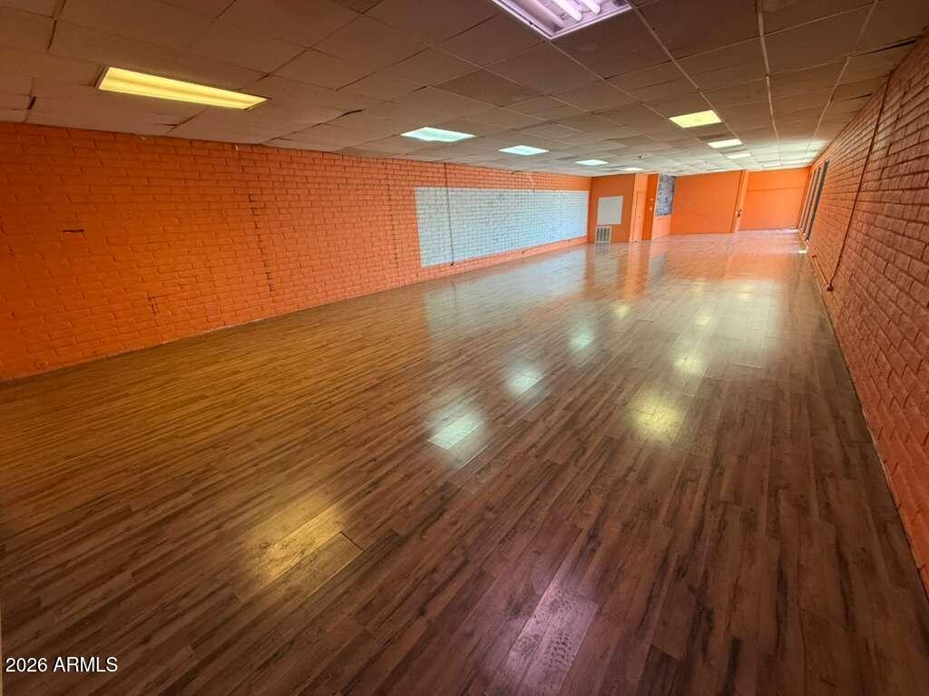 Position your business in the heart of downtown with this versatile and highly visible commercial space, perfectly suited for a dance studio, karate dojo, martial arts academy, yoga center, Zumba classes, fitness training, or wellness programs. Approximately 2,000 square feet of open floor-plan space. AC/ Heater.