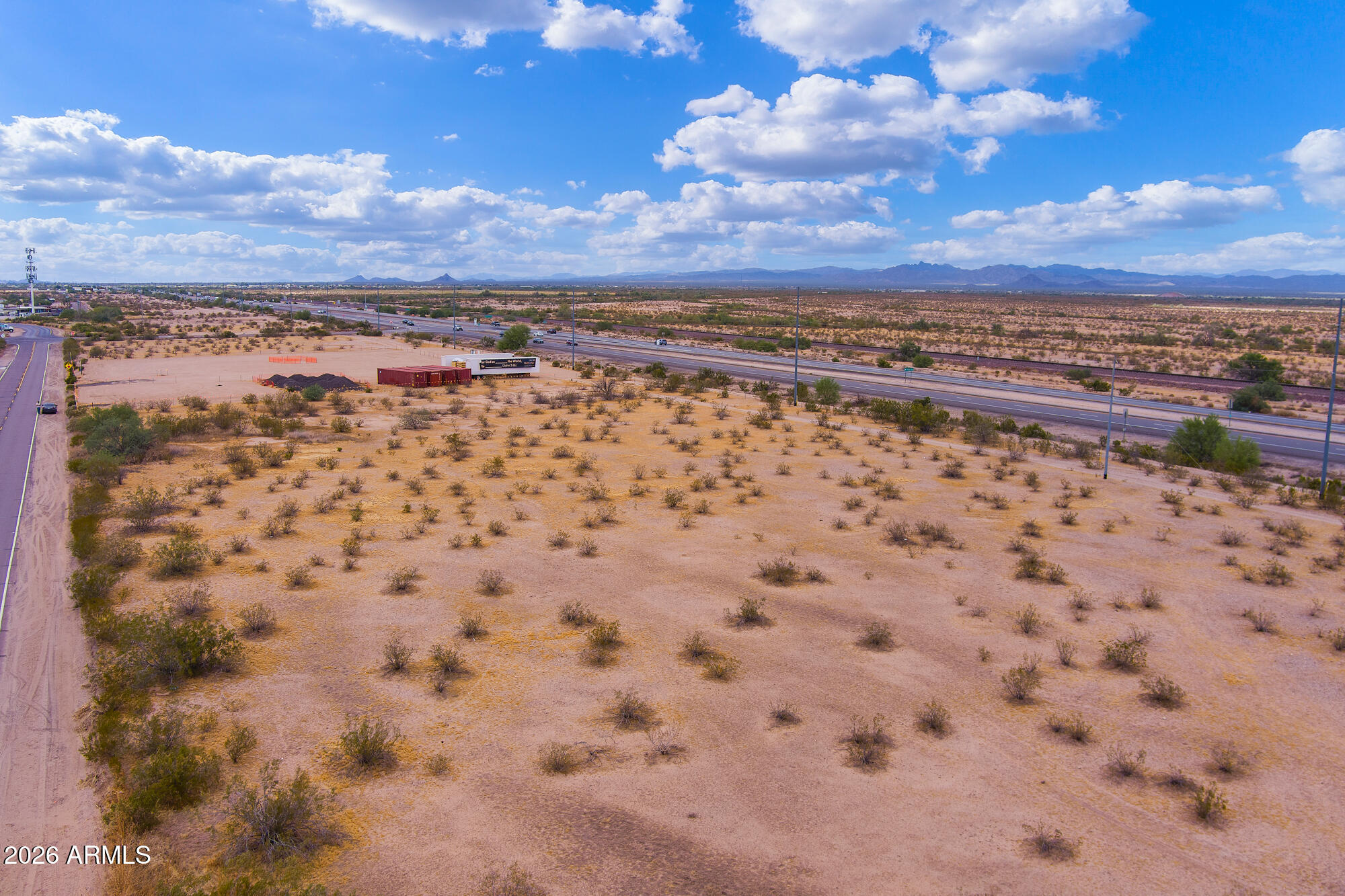 Prime commercial development opportunity on 3.526 acres located at 20125 W Hwy US60. The property offers significant potential for various business uses, subject to obtaining necessary utilities. Currently, the lot requires installation of a well and septic system. A 69kV powerline runs along the frontage, ensuring strong electrical capacity for future development. Additional adjoining lots are available, allowing for expansion to create a larger commercial footprint.  

Frontage, ensuring strong electrical capacity for future development. Additional adjoining lots are available, allowing for expansion to create a larger commercial footprint.