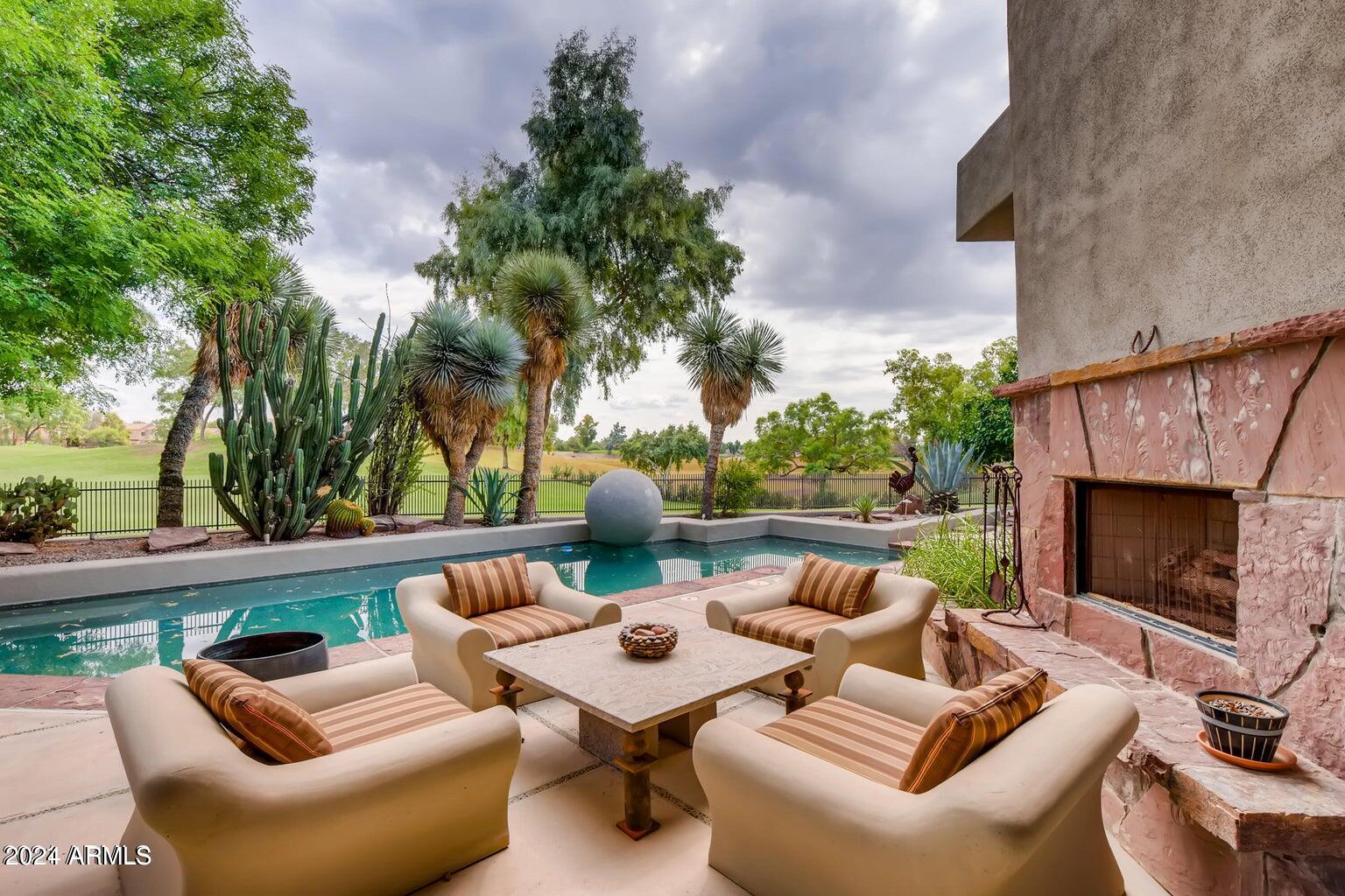Enjoy the Gainey Ranch Lifestyle in this architectural custom masterpiece with expansive views of the 2nd fairway of the Dunes golf course and a 3-car garage. The large primary suite and den/gym are on the main level along with a perfectly positioned wet bar. 2 ensuite bedrooms and an office/family room are on the upper level. Expansive windows in the living room welcome the outside in and provide stunning views throughout. A desert oasis with a heated pool, private, secluded spa and grill area allow for the perfect point of relaxation or entertainment. Gainey Ranch offers an array of amenities, including golf, tennis, pickleball, a fitness center, and a community pool, along with easy access to everything Scottsdale has to offer.