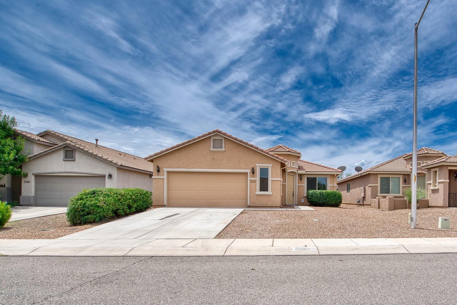 Beautiful Move In Ready 3 bedroom split floor plan home in Campstone Subdivision. Open concept floor plan with a large kitchen that overlooks the family room. In the kitchen you will find a large island great for those family gatherings along with 36'' upper cabinets and tons of bottom cabinets and countertop space. Large master bedroom with a bay window and a large bathroom with separate tub/shower along with your own walk-in closet. You also have another area in the home that you can make a second living room, formal dining room or home office. Hallway bathroom has a tub/shower tile surround. Two other bedrooms are great in size both with newly installed ceiling fans. Patio door and front door are 8' in height and all windows have custom faux blinds installed.