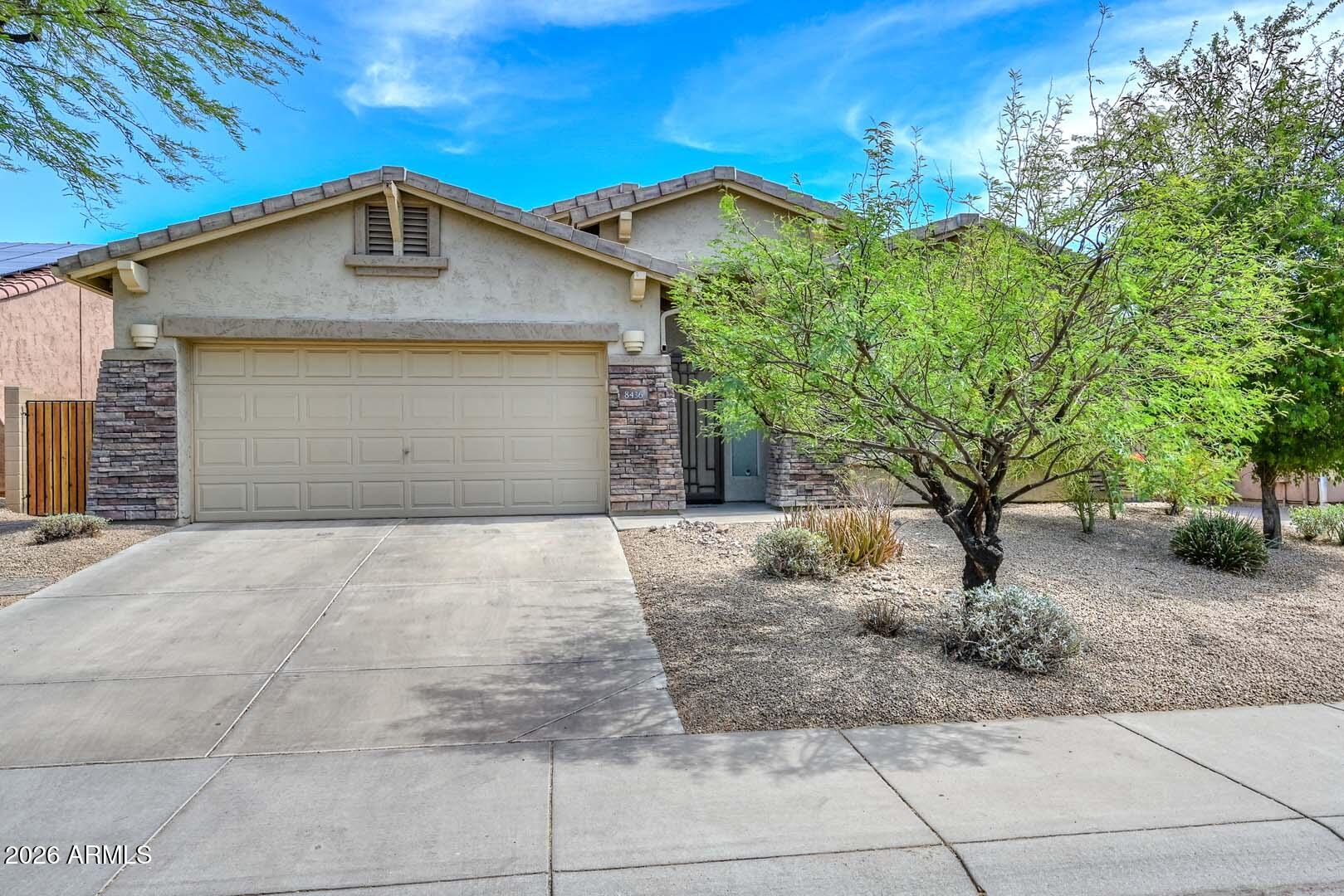 Nestled in the highly sought-after WestWing Mountain community, this light, bright home offers the perfect blend of comfort, functionality, and Arizona outdoor living. Featuring 3 spacious bedrooms plus separate living and family rooms. 
Beautifully appointed kitchen has raised-panel maple cabinetry, pull-out shelves, large island, gas stove, walk-in pantry, skylight.  Tile and hardwood throughout bedrooms and living spaces. The private primary retreat includes a sliding glass door leading to the back covered patio, heated pool and spa.  Ceiling fans throughout. Security screen front door
Insulated garage door
Utility/service door from garage to yard
Level 2 electric car charger
New RV gate. Close to A+ school and parks/trails