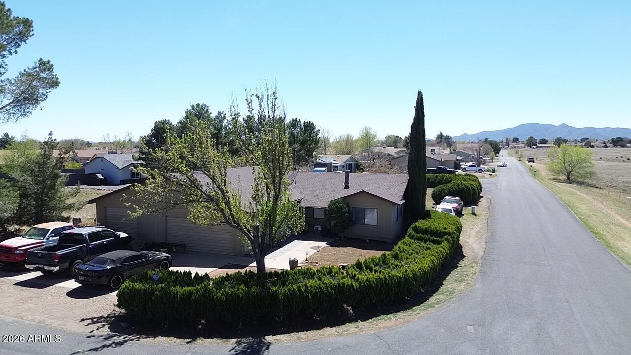 Come take a look at this beautiful open-concept home in Prescott, Arizona--perfect for getting away from the heat! This corner-lot property features a spacious 3-car garage and offers 3 bedrooms, 2 bathrooms, and a good-sized yard. Recently updated with new flooring, a modern kitchen, and much more, this home is move-in ready. Don't miss your chance to see it  today!