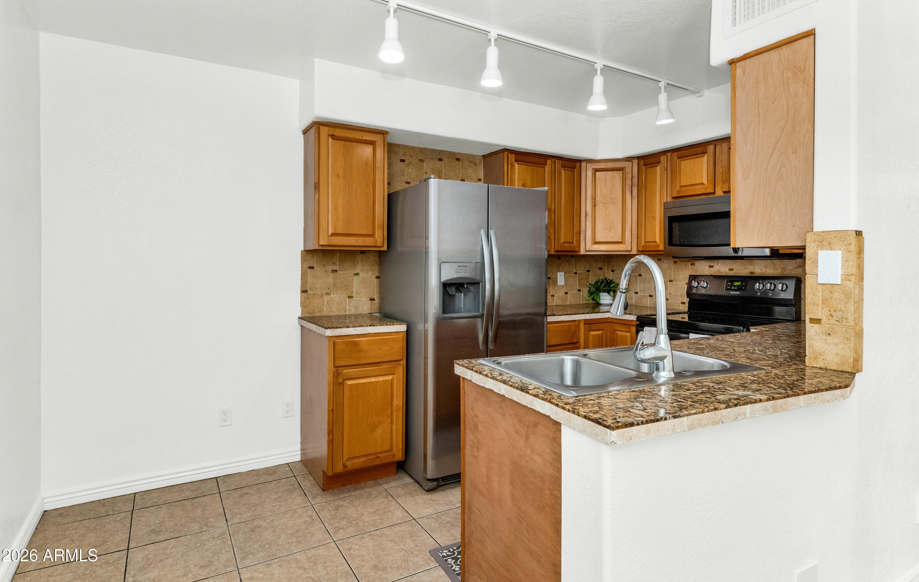 CIENTO CONDOMINIUMS - Residential