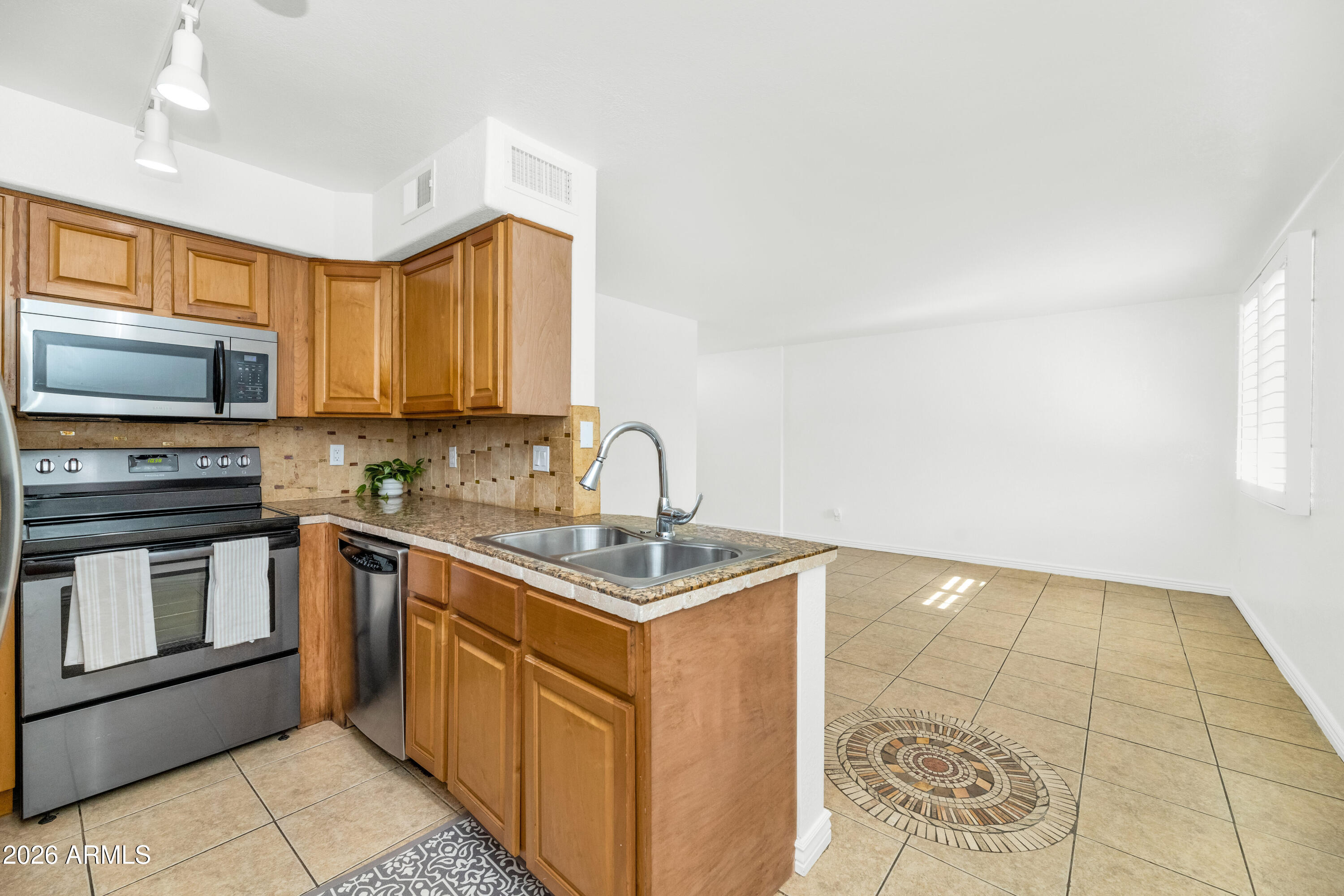 CIENTO CONDOMINIUMS - Residential