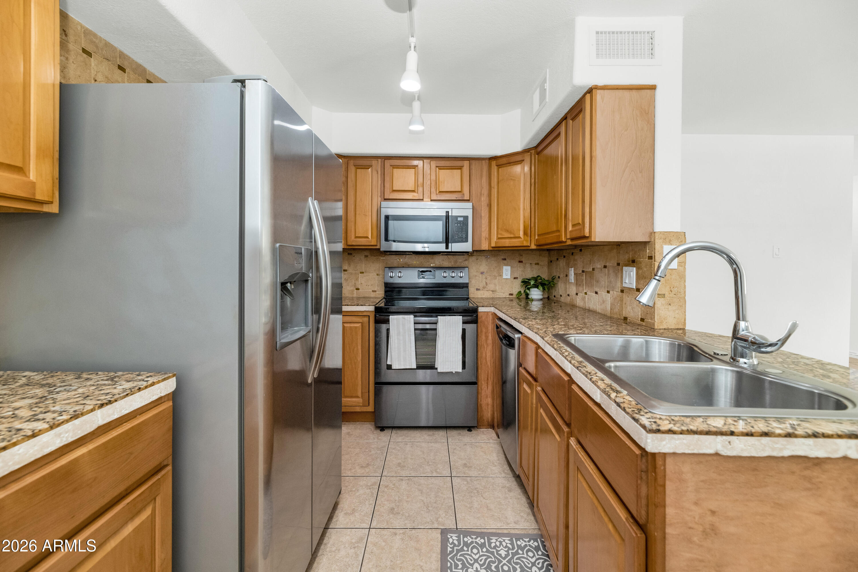 CIENTO CONDOMINIUMS - Residential