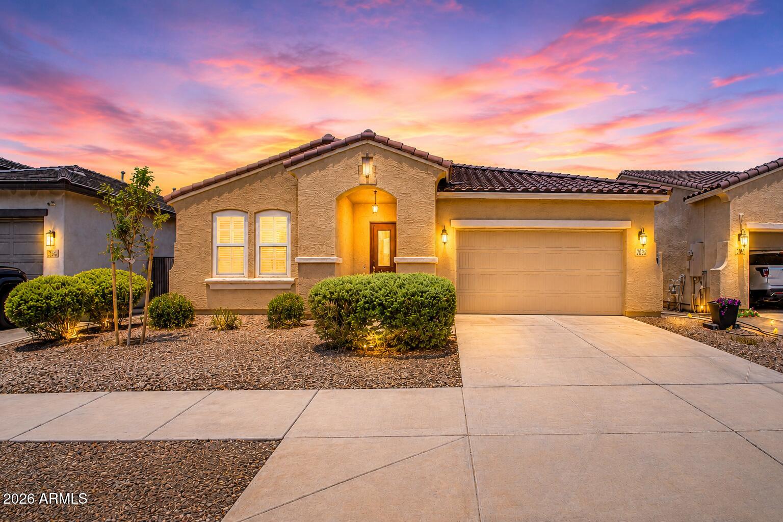Welcome to this beautifully maintained, move-in-ready home offering the perfect blend of comfort and functionality! Inside, you'll find fresh paint, tile flooring, plantation shutters, recessed lighting, ceiling fans, and a spacious open-concept layout with expanded ceilings. The newer kitchen features white cabinetry, granite countertops, stainless steel appliances, a walk-in pantry, and a large island with breakfast bar. A dedicated office/den, versatile bonus room, and Jack & Jill bathroom provide flexible living space. Relax in the spacious backyard with a covered patio, gazebo, and new above-ground spa. Conveniently located near Westgate Entertainment District, State Farm Stadium, Desert Diamond Arena, shopping, dining, parks, and major freeways.