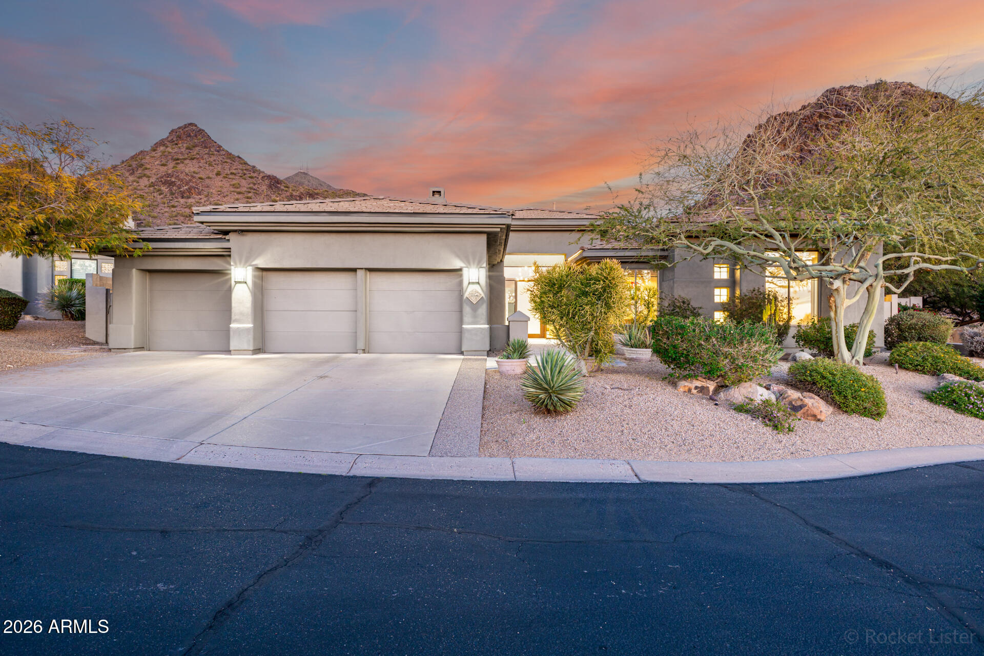 Stunning views from this contemporary home in a quiet cul-de-sac in Trovas at McDowell Mountain Ranch. Popular Medici model with 3 Bedrooms, 4.5 Baths, Office and exercise room. Step through the iron door to amazing views through a wall of glass. Great room concept with glass rock fireplace and entertainment built-ins. Highly-upgraded kitchen with walnut cabinets, Caesarstone counters, dual dishwashers, dual warming ovens, professional gas range, double ovens, oversized refrigerator and pantry with beverage cooler. Tile flooring throughout for seamless flow. Split primary bedroom with collapsing double doors, spa-like bathroom with granite soaking tub, walk-in steam shower adjacent to exercise or flex room and full laundry room with storage. Guest wing includes media room, two ensuite bedrooms. Office with built-in desk and private patio access. Remote-control shades and surround sound add to the smart touches in this home. Open the accordian-style wall of glass to the spectacular backyard bordering the preserve, perfect for entertaining under covered ramada with grill, firepit and heated pool and spa. Just blocks from the Gateway Trailhead for miles of hiking. McDowell Mountain Ranch offers amazing amenities with clubhouse, fitness center, multiple pools and activities.