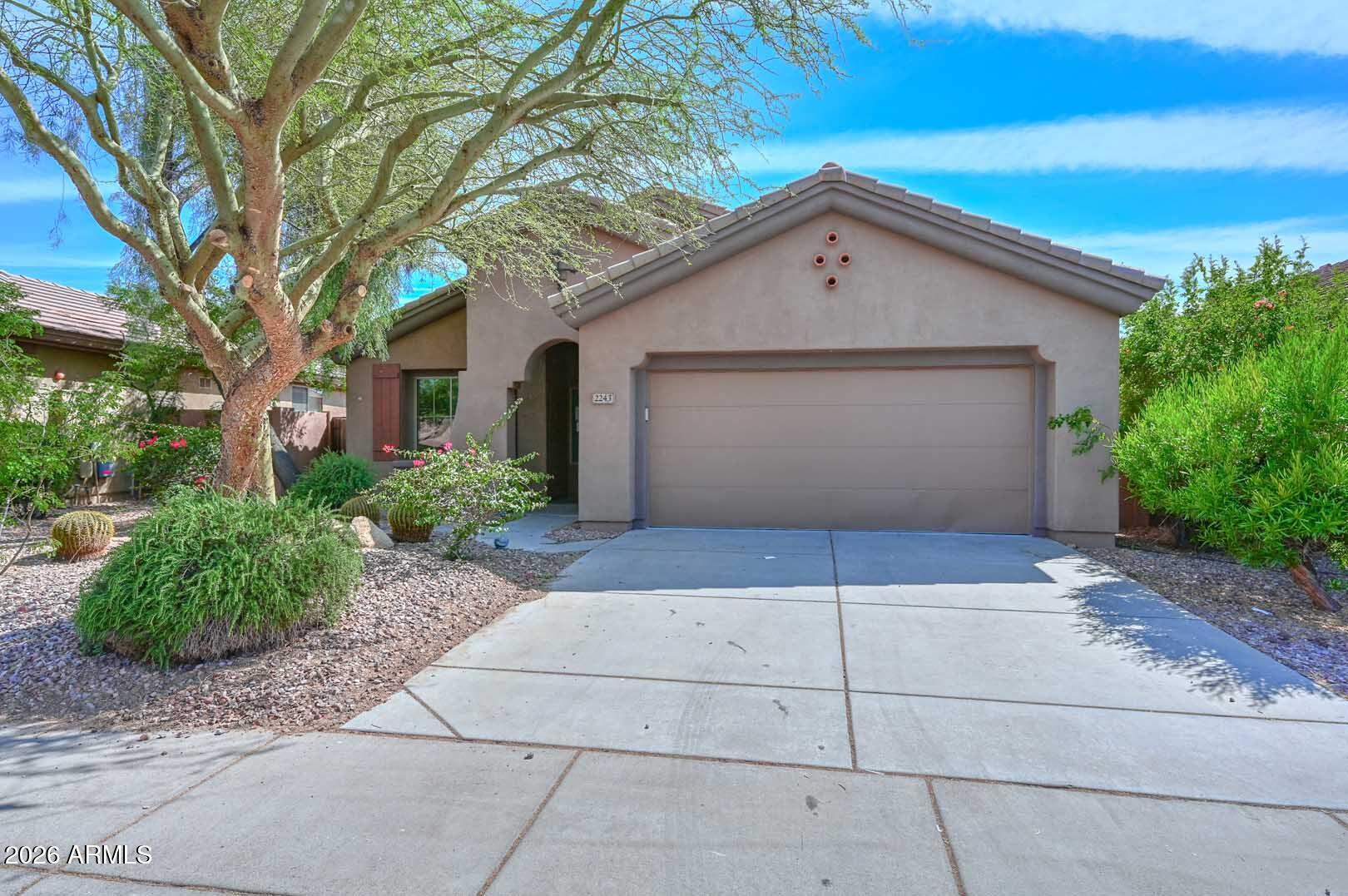 Located in the exclusive guard-gated Anthem Golf & Country Club, this 3 bed, 2 bath home offers the perfect blend of comfort and resort-style living. The open great room floorplan features a spacious kitchen with granite tile counters overlooking the living room with cozy fireplace. The primary suite includes a walk-in closet plus a luxurious bath with separate tub and shower. Enjoy Arizona outdoor living with a covered patio, extended tile lounging area, and built-in BBQ. Residents enjoy world-class golf, pools, fitness, dining, and the unmatched lifestyle of Anthem Country Club.