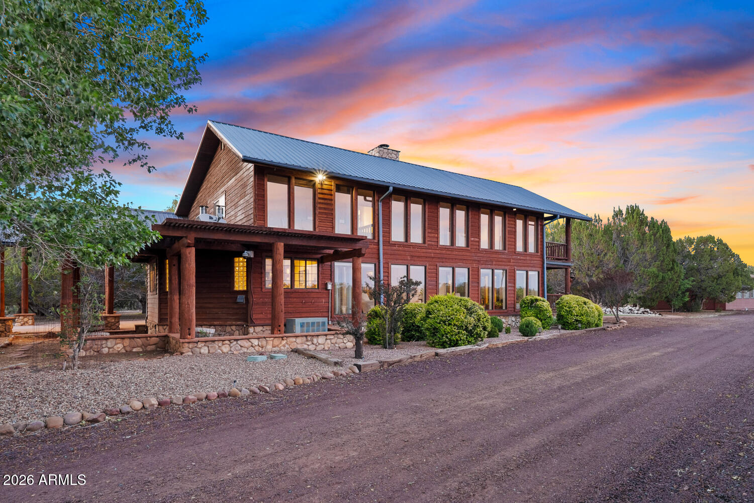 Some properties are defined by what was built on the land. This one is defined by the land itself.
Set at the edge of the Mogollon Rim in the White Mountains of Arizona, this 39.5-acre estate sits where the terrain drops away into canyon and the world opens up. Show Low Creek runs below. The pines stretch in every direction. A 20x20 ramada with wood railing marks the canyon's edge, perfectly positioned to take in a view that cannot be found anywhere else in the region.
The Estate
The 5,712 sq ft custom home was designed for people who take both living and entertaining seriously. An elevator services both levels. A dedicated office provides quiet workspace separate from the main living areas. The sunroom, remodeled in 2024 with new windows, brings the mountain light inside. The wrap-arou deck spans over 1,500 sq ft across two levels, offering mountain, canyon, and panoramic views from nearly every angle.
The Chef's Kitchen
Built around serious cooking and thoughtful entertaining. A Viking gas double oven and range anchors the space, paired with a KitchenAid built-in refrigerator, built-in fryer, warming drawers, trash compactor, and multiple dishwashers.
Outdoor Living
A covered pergola with built-in BBQ, water, electric and propane connections sits alongside a private heated spa, surrounded by manicured lawn and mature landscaping fed by a full irrigation system. Raised garden beds and a greenhouse extend the outdoor living experience. At the canyon's edge, the original ramada frames Show Low Creek and the open sky in a setting that defines the property.
The Land
39.5 acres across seven parcels, with Show Low Creek along the canyon edge, 80% perimeter fencing, and a large open clearing suited for additional structures or expanded use. Originally a working Christmas tree farm, the land has been meticulously maintained and carries a richness that only comes with time and intention.
Infrastructure
A 4-car garage (24x36, 16-ft door), a fully equipped 24x30 shop with bathroom, electric and separate septic, an 8x10 well house with tank and filtration system, and two dedicated backup generators serving the home, garage, shop and well house independently. The property is built for full self-sufficiency.
Recent Improvements
Cedar siding restained and decks restored, 2025 ($50,000). Half roof updated to metal with new skylights, 2025 ($18,000). Elevator installed, 2024 ($30,000). Sunroom remodeled with new windows, 2024 ($25,000). All structures repainted, 2023 ($10,000). Total recent investment: $133,000.
Access
Show Low Regional Airport (SOW) offers daily nonstop service to Phoenix Sky Harbor via Contour Airlines. Phoenix is approximately 175 miles and three hours by car. Pinetop-Lakeside is ten miles away. Fool Hollow Lake is minutes from the property.
Properties of this caliber, on land this distinctive, at this elevation and in this setting, do not come available often.