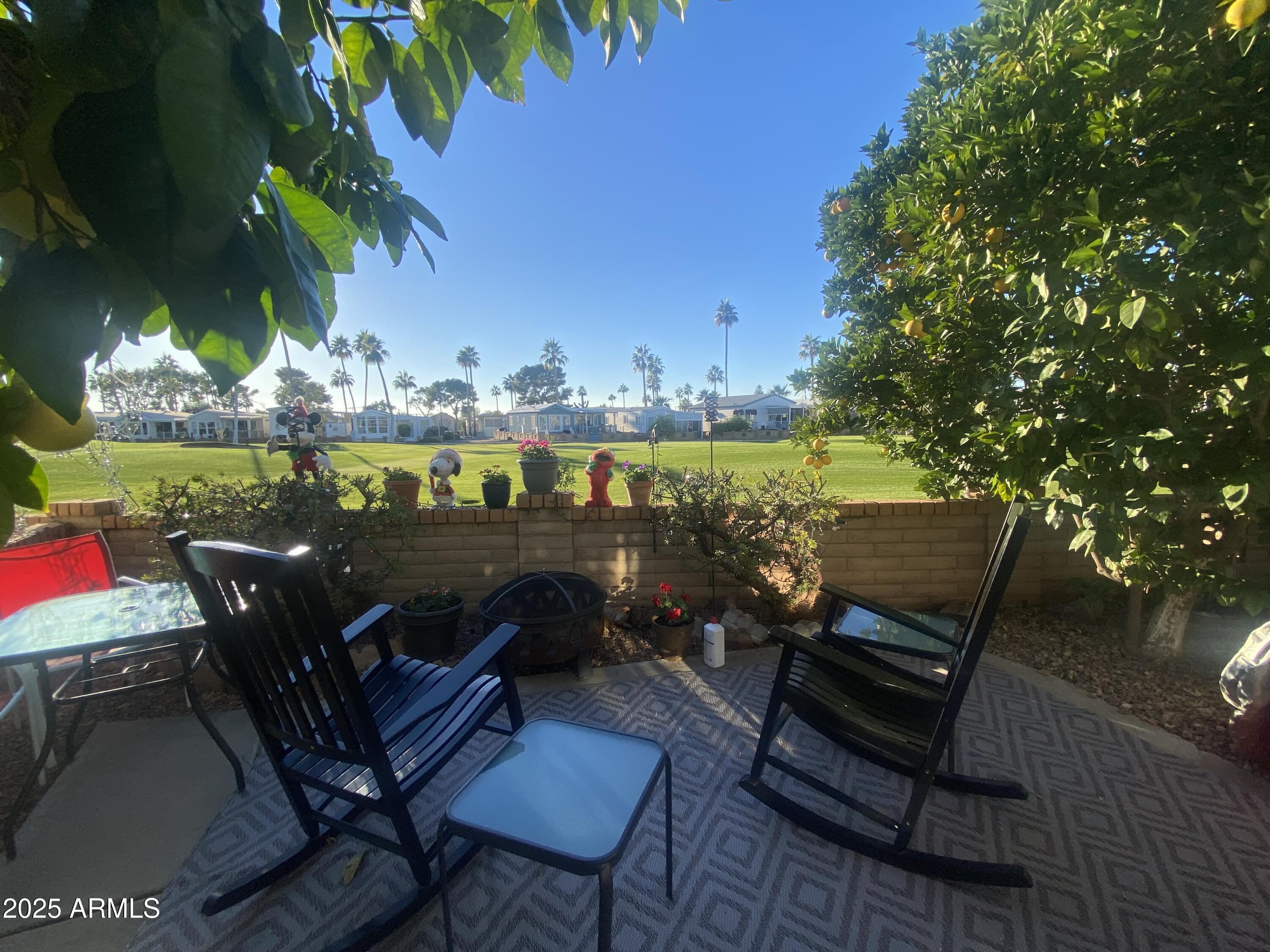 View Arizona's famous sunsets from this beautiful golf course property! Complete with 2 bathrooms and a spacious Arizona room addition. No interior steps! Garden style back porch with fairway views and plenty of privacy! This is the perfect location to spend your winters! Plenty of room for entertaining and sleeping overnight guests. You will love this quite location.
