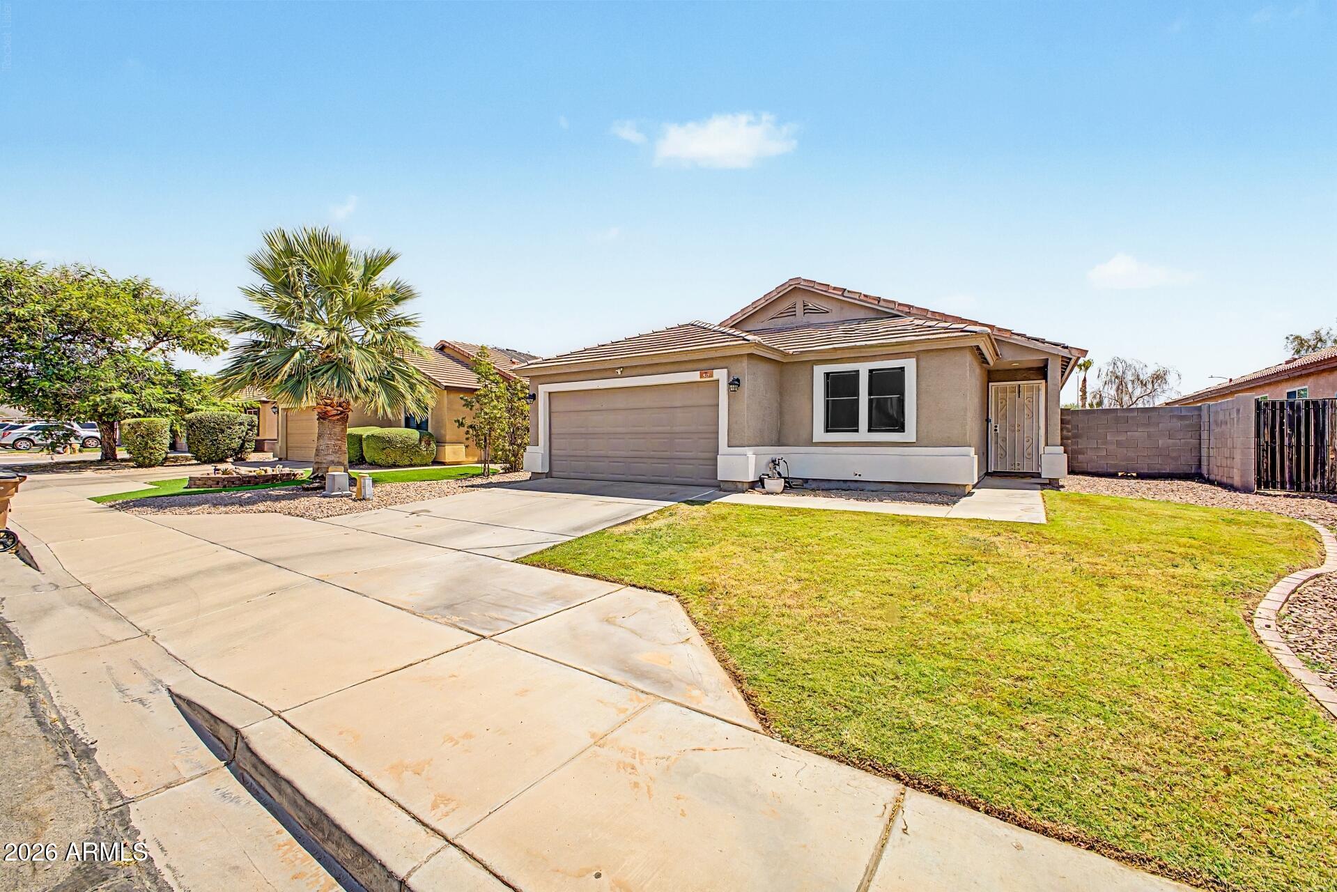 This home features a desirable split floor plan with 4 bedrooms and a spacious great room. The kitchen offers custom paint finishes and stainless steel appliances, creating a warm and inviting space for everyday living and entertaining. The primary suite opens to a large bathroom complete with dual sinks, a walk-in closet, and a separate toilet room. The home and yard could use a little TLC, including AC repairs, but with some updates and care, this property has the potential to truly become your ''home sweet home'' or investment property.