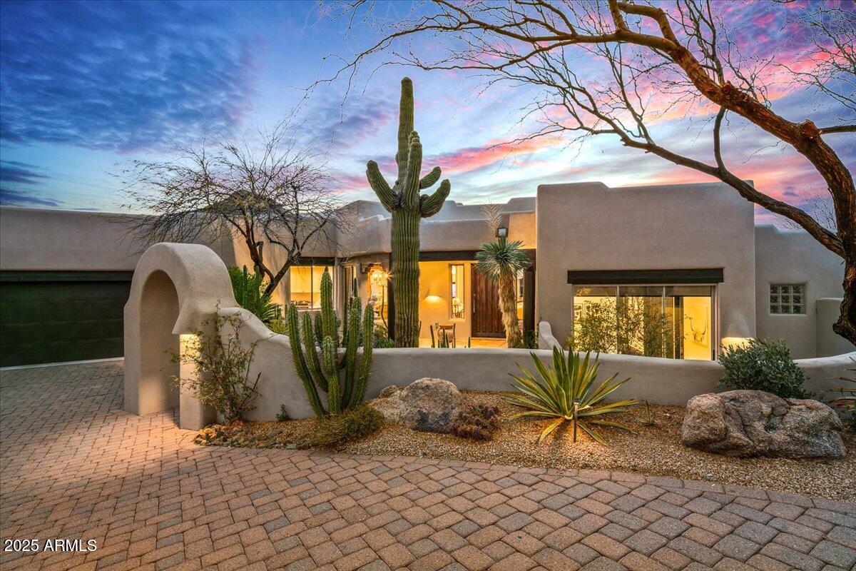 Warm, charming, and fully remodeled!  This home is being offered fully furnished with the availability of a full golf membership to the Desert Mountain Club. Beautifully updated in 2024, this southwest themed home is the perfect blend of rustic and contemporary finishes. Centrally located on a quiet cul-de-sac and just a few minutes to the heartbeat of Desert Mountain, the Sonoran Clubhouse. This open layout features a split floor plan and a generous living area adjacent to the gourmet kitchen. An expansive covered patio greets you to the crystal blue pool and spa. A separate detached Casita awaits your weekend guests. Enjoy a Sonos sound system with built-in speakers throughout. Stunning mountain and sunset views as far as the eye can see. An easy transition into the DM lifestyle!