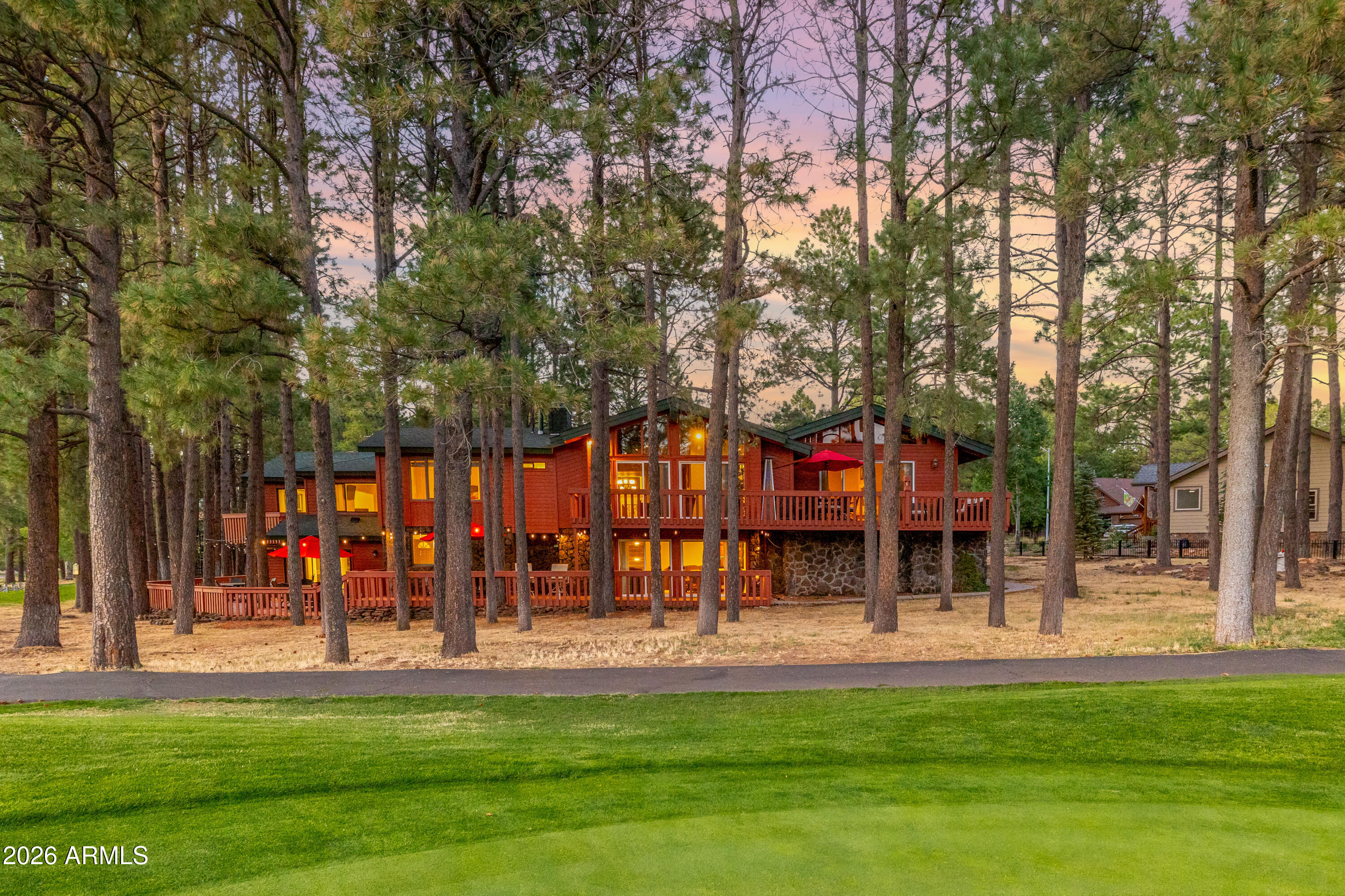 Welcome to the ultimate multi-generational golf estate located in Continental Country Club, boasting over 6,588 sqft and situated on a spacious cul-de-sac lot. This luxurious home offers breathtaking views from every window, overlooking the eighth green with panoramic vistas of three fairways and a fountain-fed pond on Aspen Valley Golf Course.Perfect for relaxation, the home features wrap-around decks and patios, providing ample space for everyone to unwind and enjoy the stunning surroundings. With 4 bedrooms, 4 full baths, and 1 half bath, along with 3 flexible rooms that can be utilized as additional sleeping or bunk areas, this property offers versatility to accommodate various needs.The main family room and kitchen area serve as the heart of the home, featuring a chef's kitchen complete with Viking range and custom hood, designer maple cabinets, and a center island. The single-level living design includes a large primary en-suite with a sitting room, private balcony, and office area, as well as a 2nd Jr primary bedroom and two additional bedrooms with a full bath in the hallway.Wood, travertine, and marble flooring complement the vaulted ceilings and exposed beams, creating an elegant ambiance throughout the home. For added convenience, an elevator is available to access different levels. The property also boasts three fireplaces, a lounge area with a fireplace, a spacious game/media room, a spa room, and a serene zen atrium area.The lower level provides an opportunity to create your own wings, featuring a bonus guest quarters with additional living rooms, bedrooms, and a full kitchen. This home is perfectly suited for hosting large gatherings or serving as a summer corporate golf retreat.Recent updates include a new roof, freshly painted exterior, new carpets, and new additions such as a table shuffleboard, poker table, piano, and patio umbrellas. The Man cave has a new bar with low padded stools and matching high tops, creating the perfect entertainment space.Additional enhancements include a new Master Bedroom bed, sofa, love seat, and large-screen TVs throughout, including the Man Cave. The home now features an oversized Jacuzzi spa tub in the indoor vented Spa Room.The property is also equipped with a new oversized elevator and shaft, and an instant hot water system has been installed for added convenience. Two fireplaces have been converted from wood to gas, with wall remotes for easy control. Two new air conditioners have been added to enhance the heating system, covering all areas except the Kitchen/Livingroom.Lastly, a new cement-colored driveway for four vehicles and a front door deck have been poured to enhance the property's curb appeal.This remarkable home offers an unparalleled lifestyle, combining elegance, comfort, and spectacular golf course views. Whether seeking a permanent residence or a luxurious summer retreat, this property is sure to exceed all expectations.