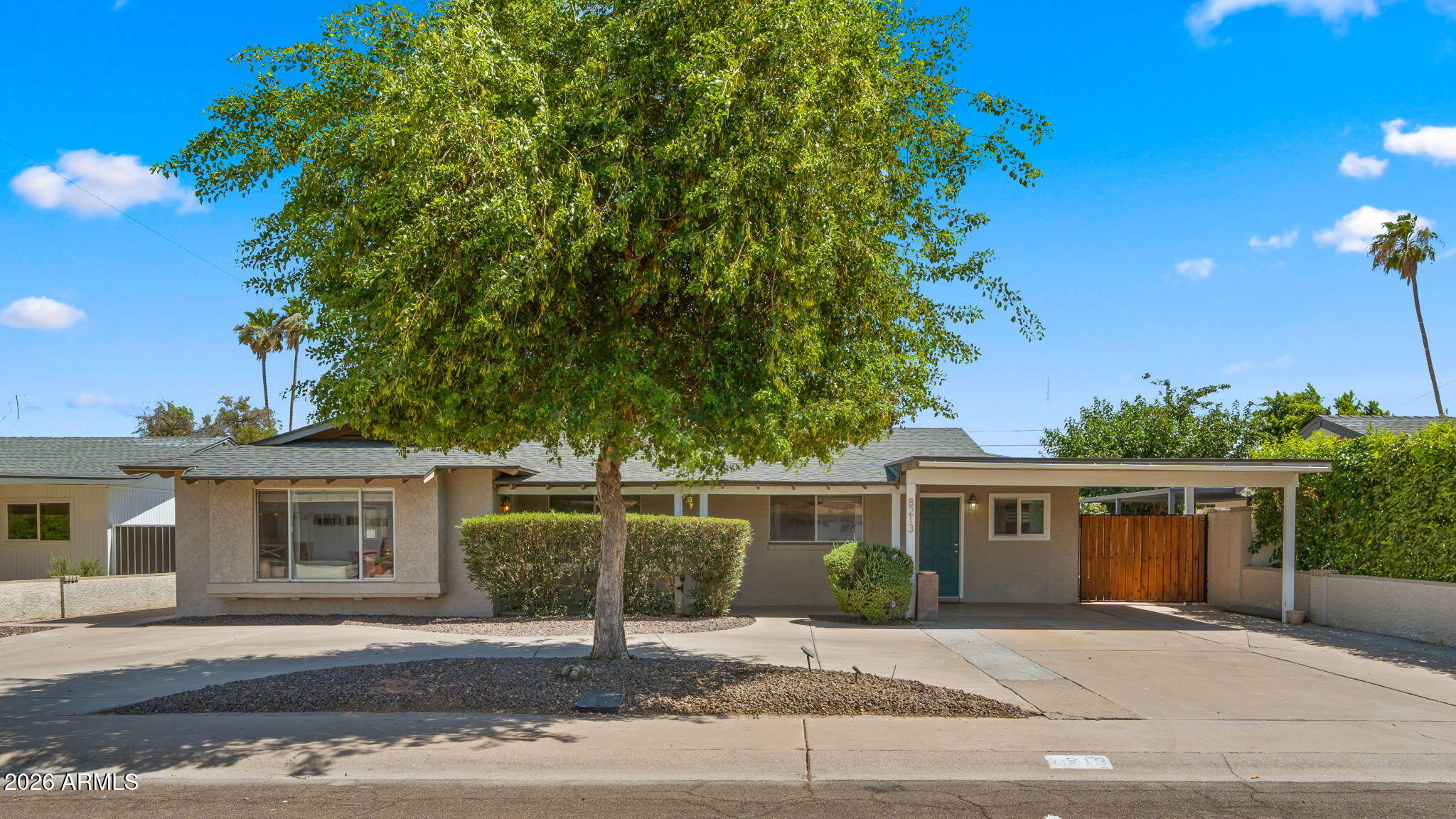You found it! Whether you are raising a family, housing multiple generations or maximizing rental income - this 5bd/4ba Scottsdale gem delivers on every front. Families will love the open great room, updated kitchen with granite counters & island, sparkling pool & a patio perfect for Arizona living. Multi-generational households benefit from the attached guest suite with its own private entrance, kitchenette & bath - ideal for in-laws or adult children seeking independence under one roof. Investors take note: no HOA means full short-term rental freedom, with Old Town Scottsdale, world-class golf, dining, & shopping just minutes away. The 2,208 sq ft split floor plan is bathed in natural light &  flows seamlessly to a private backyard oasis with artificial turf & a beautiful pool!
