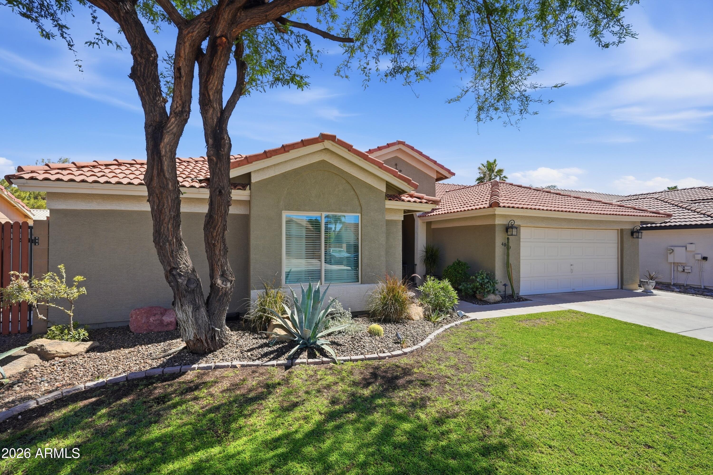 Welcome to 4019 E Morrow Drive -- a warm 4-bed, 2-bath ranch retreat in Paradise Valley Landings, where family life truly shines. Set on a 7,157 sq ft lot with NO HOA, this single-story gem delivers everything your family needs: a private pool and spa, soaring vaulted ceilings, granite kitchen, cozy fireplace, and a 2-car garage with extra storage. The primary suite features a double vanity and walk-in closet, while three more bedrooms flex for family, guests, or a home office. Energy-efficient dual-pane windows, solar screens, owned water softener and purifier, and full auto-irrigation front and back make maintenance a breeze. Great Schools located just south of the 101 freeway and Desert Ridge Marketplace