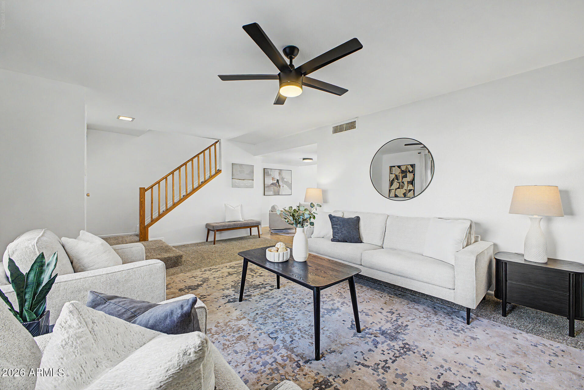 Come see this inviting townhouse in Villa Solana! The updated interior boasts a formal living room, carpeted floors in the right places, ceramic tile in high-traffic areas, stylish light fixtures, and tons of natural light. The family room seamlessly flows into the dining area, which connects to the back patio through sliding glass doors for easy indoor-outdoor entertaining. The kitchen has SS appliances, recessed lighting, a peninsula with breakfast bar, solid surface countertops, and ample cabinetry. The spacious primary suite includes 2 closets and a private bathroom. Additional highlights include a 2nd bathroom, a powder room, and laundry area. Enjoy your own covered patio, ideal for relaxing. This home features assigned carport parking and a storage shed. Don't miss this opportunity!