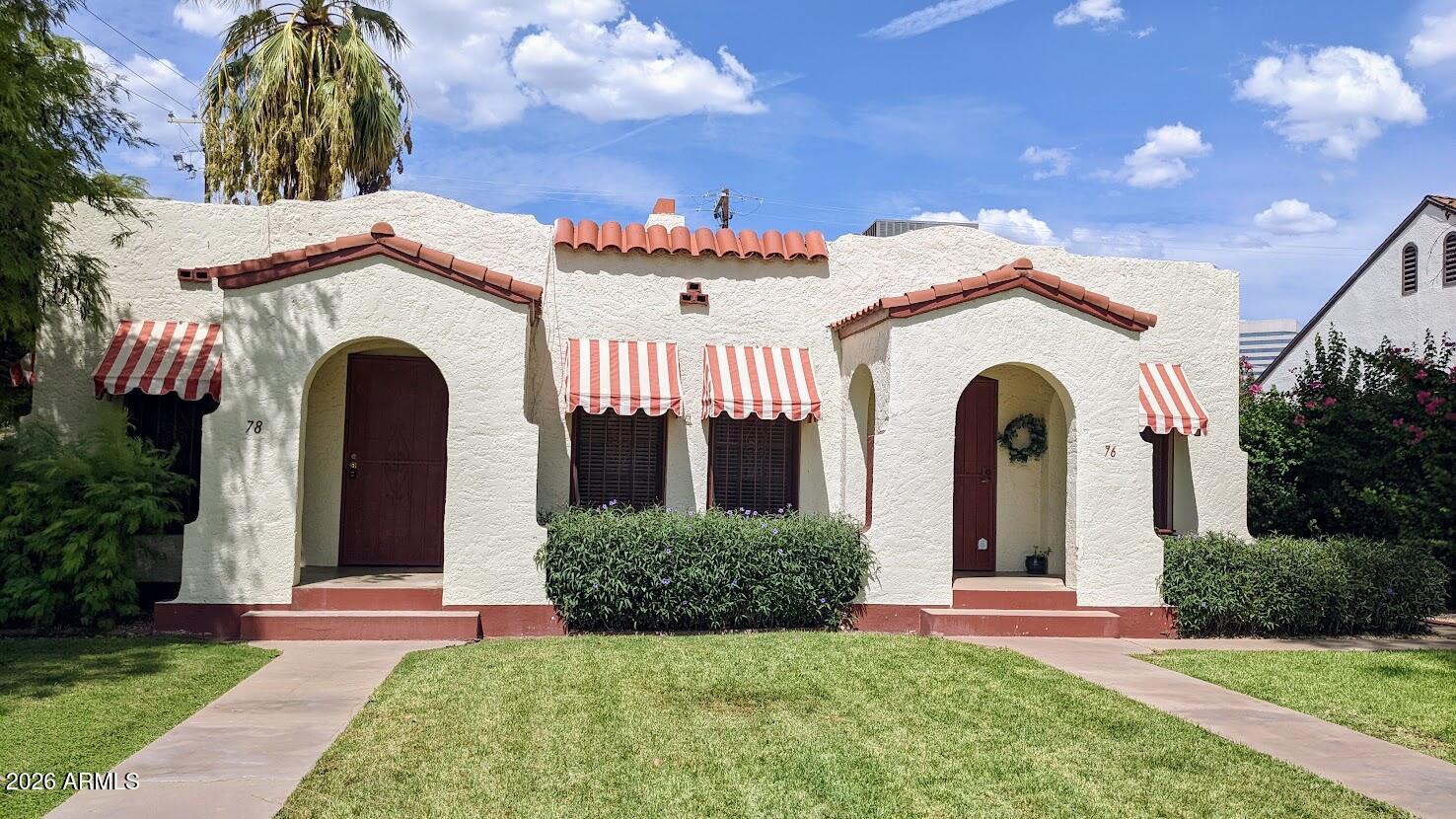 Located in the popular Willo Historic District, you're going to love your new home! Family owned for 50+ years, this completely self-contained home is part of a triplex & while ''Tiny Homes'' are all the rage, this home lives LARGE! Historic details abound, from the beautiful wood floors throughout to the cove ceilings, gorgeous fireplace with mantel & penny tile in the bathroom. The original stove & hardware in the kitchen are complemented by cut-glass door handles in the bedroom, & the original cutouts in the living room will make you swoon. Freshly painted, this home features 1 bed, 1 bath, living room, dining room, kitchen with great storage, tankless water heater & full private laundry, too. It also features covered parking, private patio, front porch & shared yard.