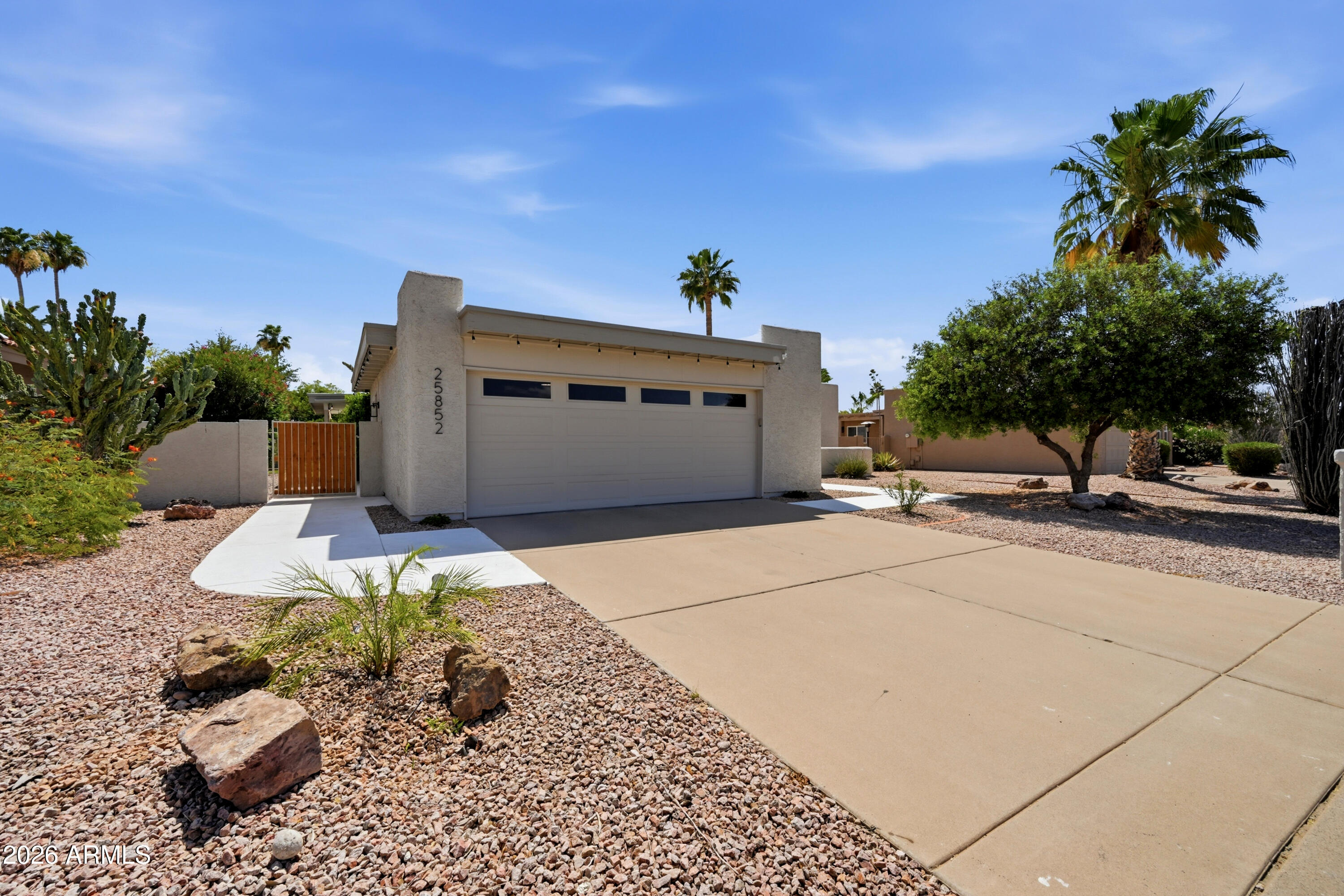 Beautifully updated and impeccably maintained home in the highly sought after Palo Verde at Cottonwood community in Sun Lakes. From the moment you arrive, the pride of ownership and attention to detail are impossible to miss. This light and bright home features vaulted ceilings, luxury vinyl plank flooring, updated dual pane windows, modern fixtures, and a thoughtfully remodeled interior that is fresh, timeless, and move in ready.
The kitchen offers soft close shaker cabinetry, quartz countertops, tile backsplash, stainless steel appliances, and an ideal layout for everyday living and entertaining. Both bathrooms are tastefully renovated with custom tile work, updated vanities, and quality finishes, while the spacious primary suite includes a beautifully upgraded dual vanity and glass enclosed shower.
Step outside to a private backyard retreat featuring a covered patio, artificial turf, and an incredibly well kept outdoor space perfect for relaxing or enjoying Arizona's beautiful weather year round. The oversized care and maintenance throughout the home truly set this property apart.
Located within the award winning Cottonwood Palo Verde community, residents enjoy access to golf, tennis, pickleball, pools, spas, fitness centers, walking paths, clubs, restaurants, social events, and an unmatched active adult lifestyle that makes Sun Lakes one of Arizona's premier retirement destinations.