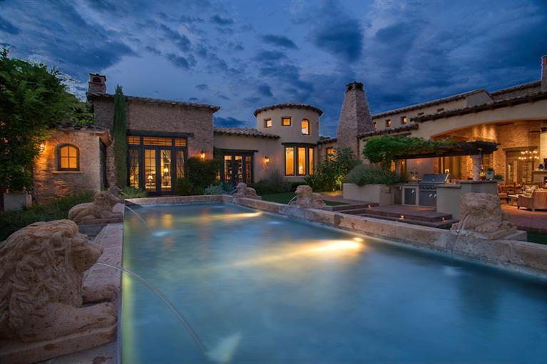 Villa Monte Rosa is a Tuscan style Villa retreat set in a hidden valley surrounded by a lush garden, vineyards and the rushing waters of Oak Creek. The expansive great room with beamed ceiling and slate floors is perfect for entertaining dozens of people with its telescoping doors that open from the living room to the barbeque ramada & loggia - an outdoor living space to enjoy the cool breezes and sounds of the creek. The kitchen is designed to be enjoyed by all with bi-level island, massive granite countertop, Wolf appliances, and open shelving to provide natural lighting. Intimate dining room features reclaimed wood plank flooring, cave rock walls, slate ceiling and two wine closets. The master bedroom wing with executive office and palatial changing... (see supplement for full remarks)