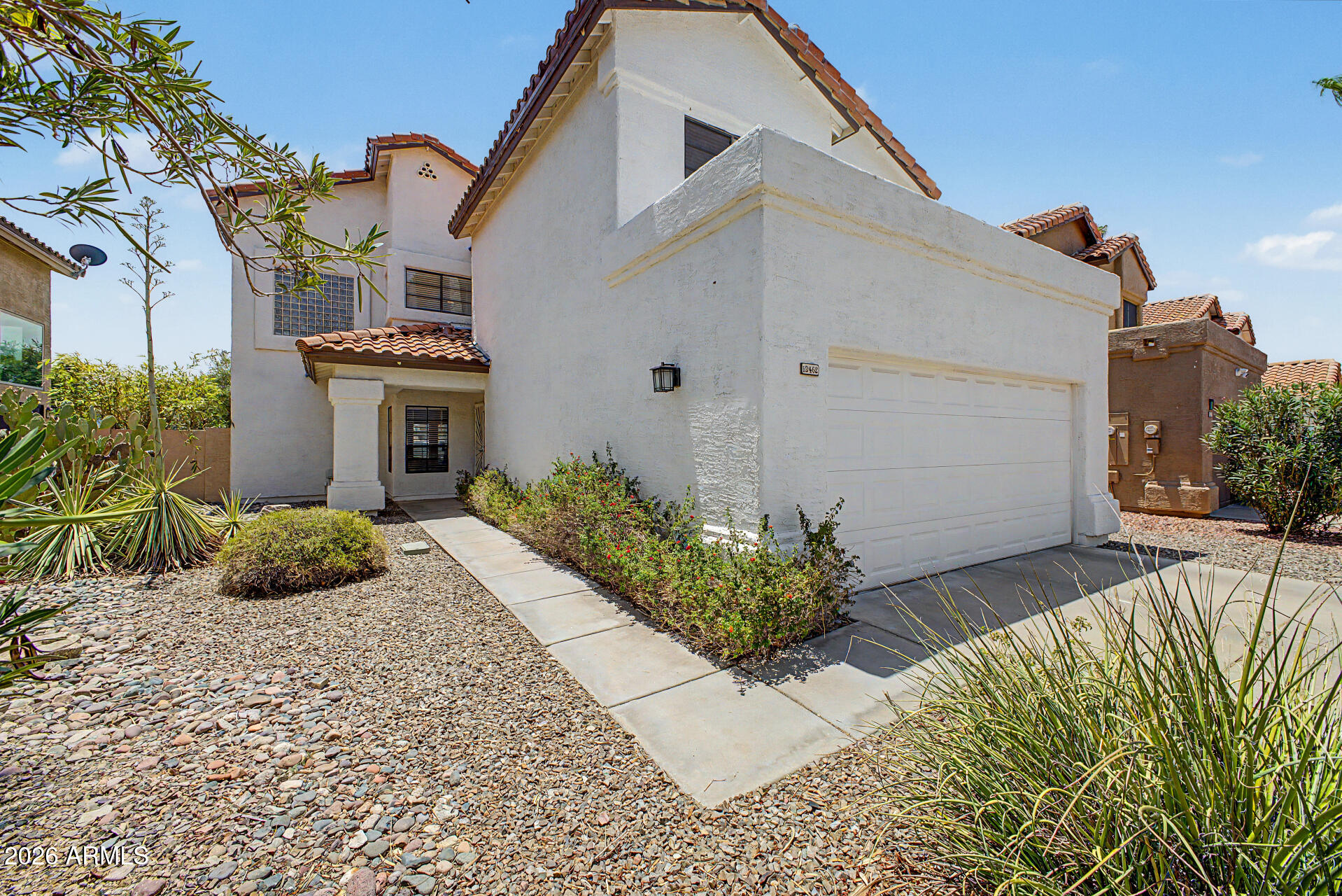 Fall in love with this stunning two-story home with a sparkling pool in the sought-after Mountainview Ranch! With the Roof, Ac, Water heater, and pool pump all recently updated, this home is the perfect of blend of value and opportunity. The interior showcases bright and inviting living areas designed with comfort in mind, featuring wood-look flooring, plenty of natural light, soaring ceilings adding an airy feel, a fireplace perfect for winter evenings, and a neutral palette throughout. The kitchen boasts a tray ceiling with recessed lighting, ample cabinetry, a granite peninsula, and SS appliances. The backyard includes a covered patio perfect for morning coffee, pavers, artificial grass, and a refreshing pool to enjoy sunny days!
