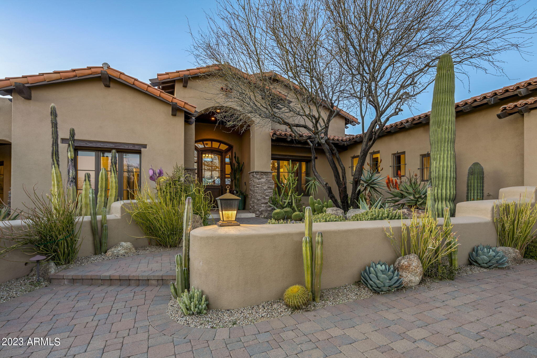 This home can be purchased nearly turn key along with a Full Golf Membership transferred with Club Board Approval. Located on a golf course lot with expansive views and privacy. Finishes include travertine and hardwood floors, granite counter tops, alder cabinetry and doors, tongue and groove ceilings with with wood beam ceilings in the great room and casita, three interior fireplaces and one on the patio, wine room, bonus room PLUS a spacious 2 room guest house with its own entrance. Bonus room is currently set up as an office but can be an additional bedroom with its own patio. The patio and pool area offer incredible mountain and down valley views. The landscaping features incredible mature cacti and trees. FULLY FURNISHED with very few exceptions. A .5% Community Enhancement Fee to be paid by the buyer at Close of Escrow.  See documents tab for list of exclusions.