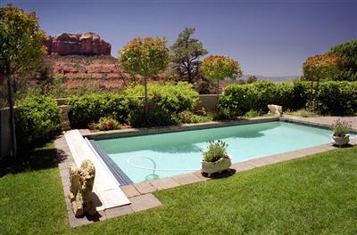 A unique home blending historical materials and style with spectacularly breathtaking views of Sedona. Located in the prestigious gated community of Back O Beyond, this custom home contains 3 bedrooms, 3.5 baths and 4447 sqft, plus a 3 car detached garage. Built in 2001, the home features 18th century hard pine flooring, antique French terra cotta 'Tomete' tile, 400 year old stone flooring, and a castle style stone fireplace mantle. The kitchen was custom designed by a French chef having incorporated an old world style limestone sink and stone countertops. The heated non-chlorine covered swimming pool is bordered by flowering gardens. Enormous picture windows capture the unobstructed views of many extraordinary red rock formations. Located on a seclude... (see supplement for full remarks A unique home blending historical materials and style with spectacularly breathtaking views of Sedona. Located in the prestigious gated community of Back O Beyond, this custom home contains 3 bedrooms, 3.5 baths and 4447 sqft, plus a 3 car detached garage. Built in 2001, the home features 18th century hard pine flooring, antique French terra cotta 'Tomete' tile, 400 year old stone flooring, and a castle style stone fireplace mantle. The kitchen was custom designed by a French chef having incorporated an old world style limestone sink and stone countertops. The heated non-chlorine covered swimming pool is bordered by flowering gardens. Enormous picture windows capture the unobstructed views of many extraordinary red rock formations. Located on a secluded cul-de-sac with .67 acre beautifully landscaped lot with drip irrigation system. The home was featured in Sedona Home & Garden Magazine and the cover of Homes & Land.