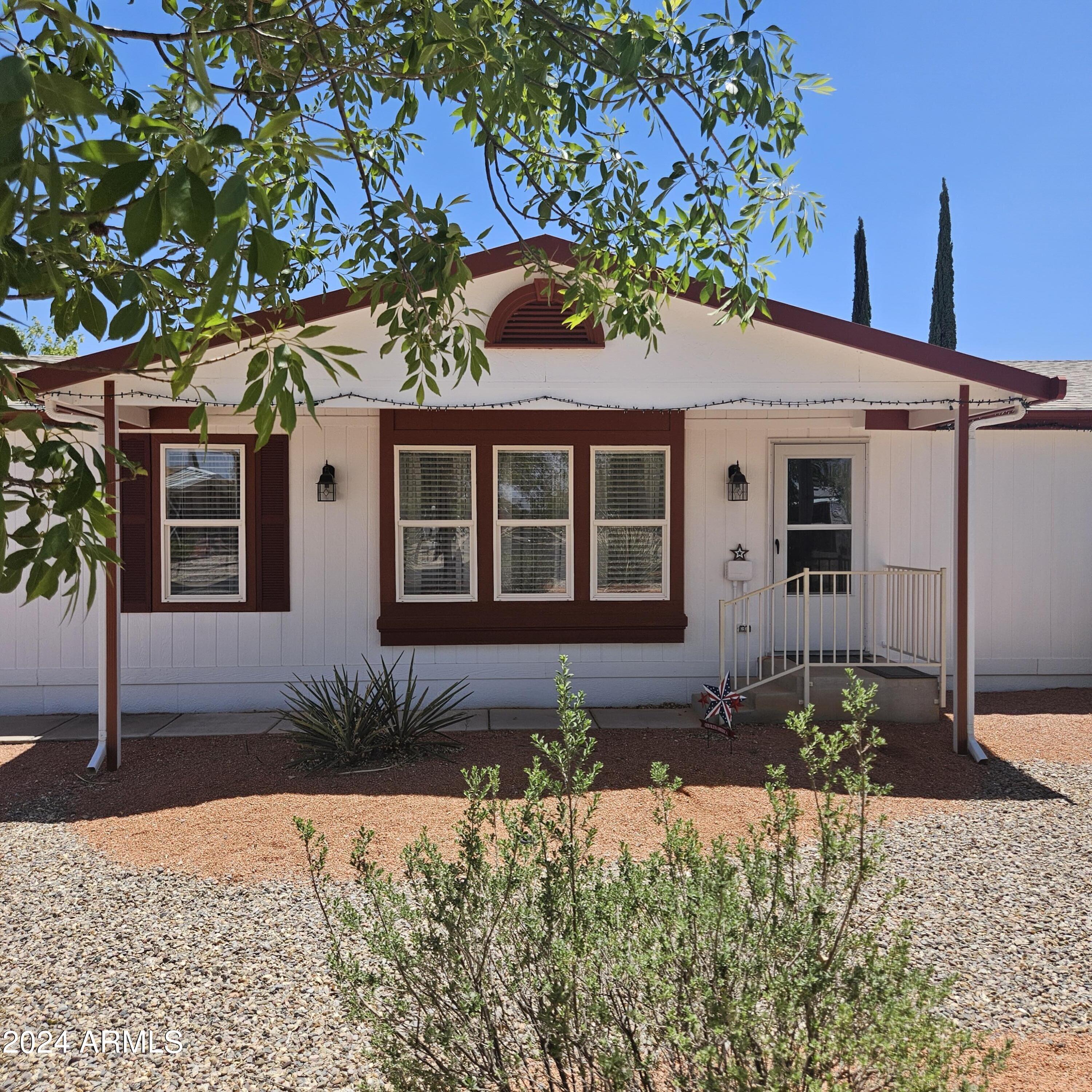In a word, Fabulous!!! 3 bedroom plus a spacious den that could be used as an office or even an additional bedroom. Huge open living area. Almost totally remodeled within the last year and a half. Beautiful, fully enclosed Arizona Room facing the mountains has many windows for a great view! ! No neighbors behind you! Large nicely landscaped easy care front yard. Backyard offers a Gazebo, a small enclosed dog run, shed, and is fenced with chain link.