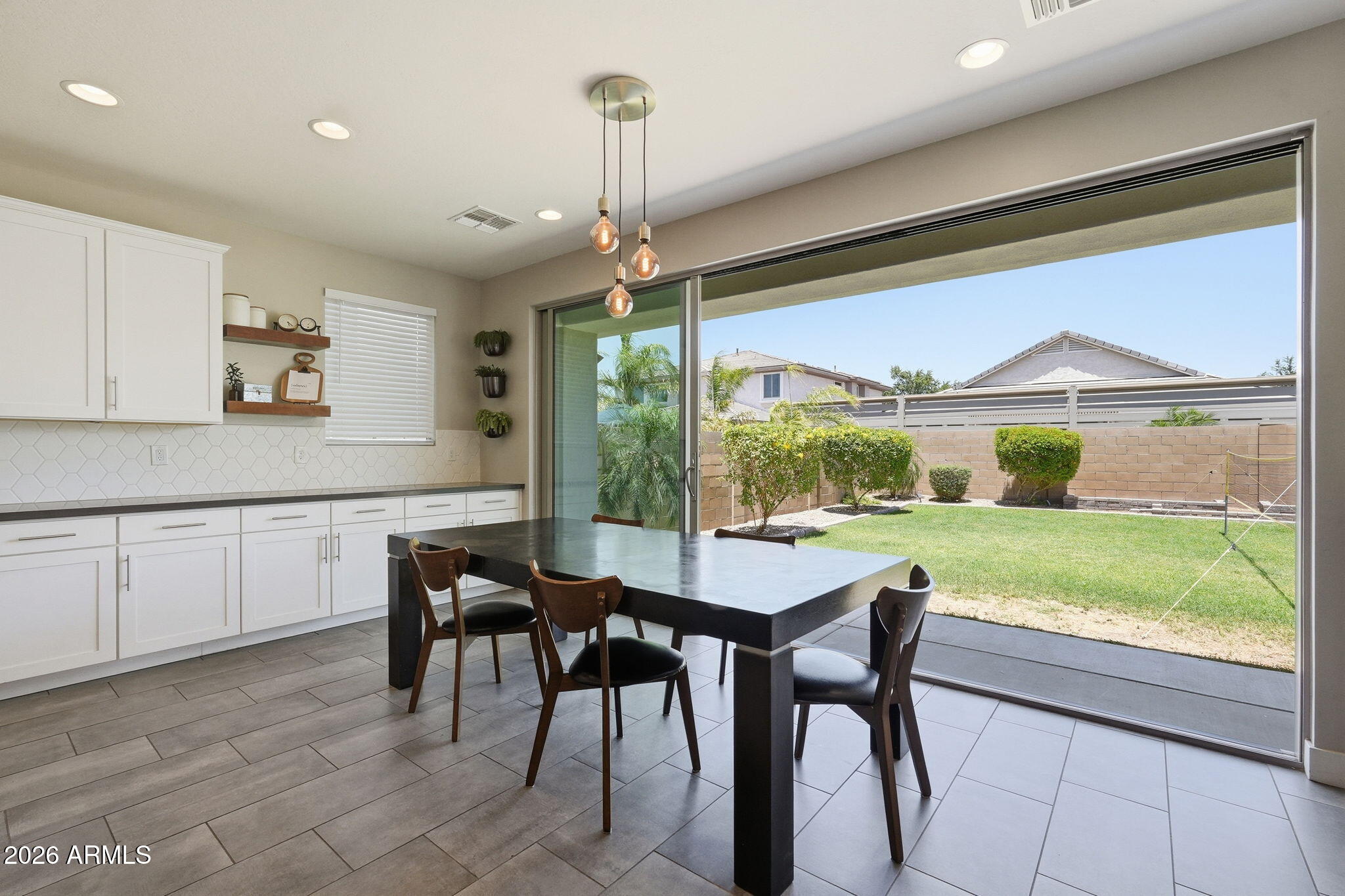 This one truly checks every box. From the moment you walk in, you'll feel the difference -- rich flooring, designer baseboards, upgraded doors, and designer touches around every corner. Every inch has been thoughtfully curated, and the beautiful neutral palette ties it all together seamlessly. The kitchen is a showstopper -- outfitted with every upgrade imaginable, a walk-in butler's pantry, and an upgraded triple slider that brings the outdoors in effortlessly. Entertaining a crowd is easily done downstairs, where you'll also find a home salon at the front of the house easily converted to a private office if needed. All the everyday living is upstairs, including a huge hang-out loft ready for a movie night. Nearly every bedroom features a walk-in closet and smart storage is tucked thro out.
A tankless water heater, oversized 3-car tandem garage, RV gate, and a backyard ready for games and gardening complete the picture. All nestled in the iconic Morrison Ranch which is truly built to be a community. Some homes just feel right from the moment you arrive -- this is one of them.