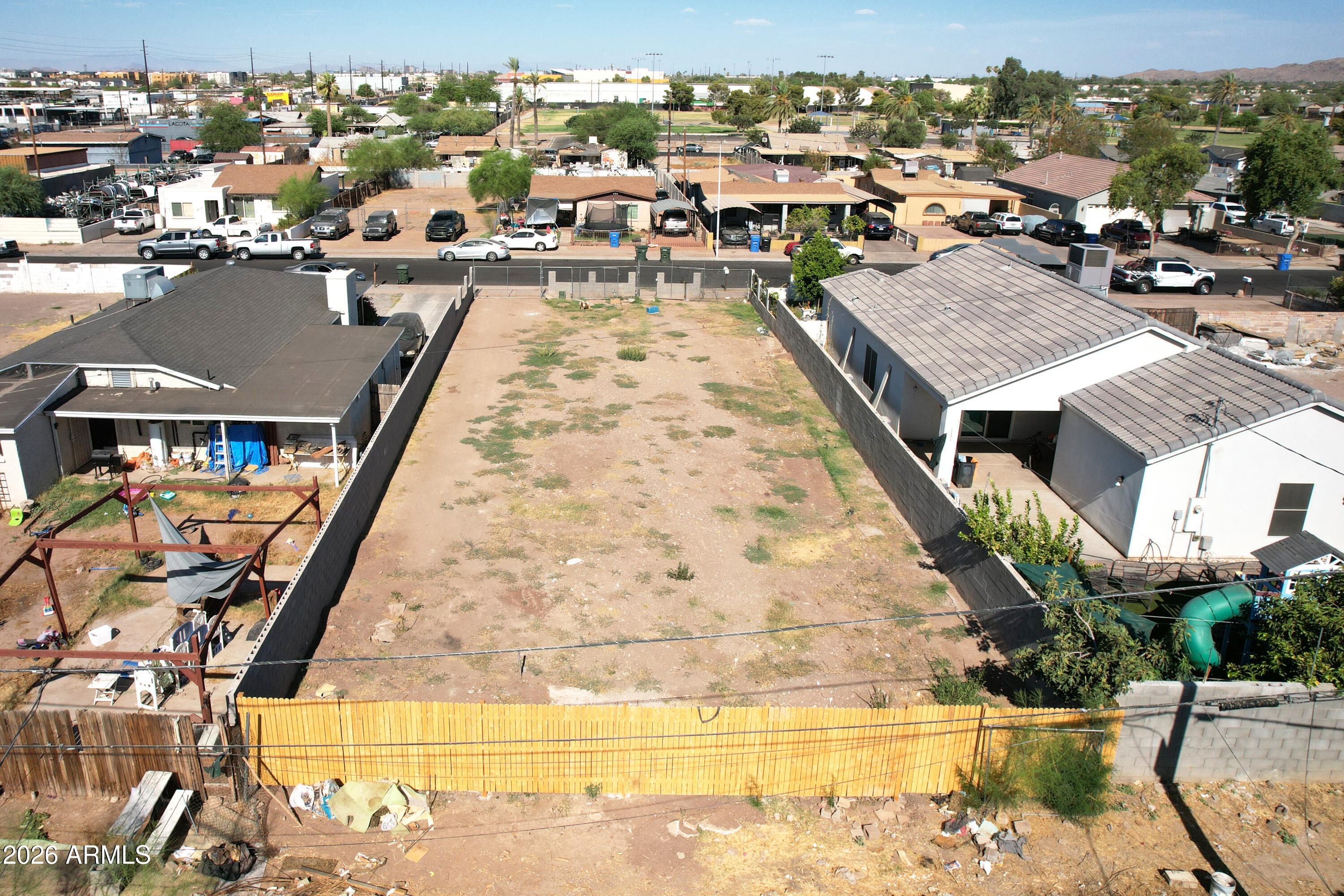 Rare opportunity to build new construction on this 0.148 acre vacant lot in an established central Phoenix neighborhood. This listing includes complete architectural and engineering plans for a 1,697 sq ft single-family home featuring 4 bedrooms, a great room, kitchen with nook, 2-car garage, and covered patio/porch fully designed with structural, electrical, mechanical, and HVAC documentation ready for permitting.
Located on S 8th Pl near E Marguerite Ave, the lot sits in a quiet residential pocket close to schools, shopping, and major routes. Skip the design phase, the groundwork is done, and you can move straight toward permitting and construction.