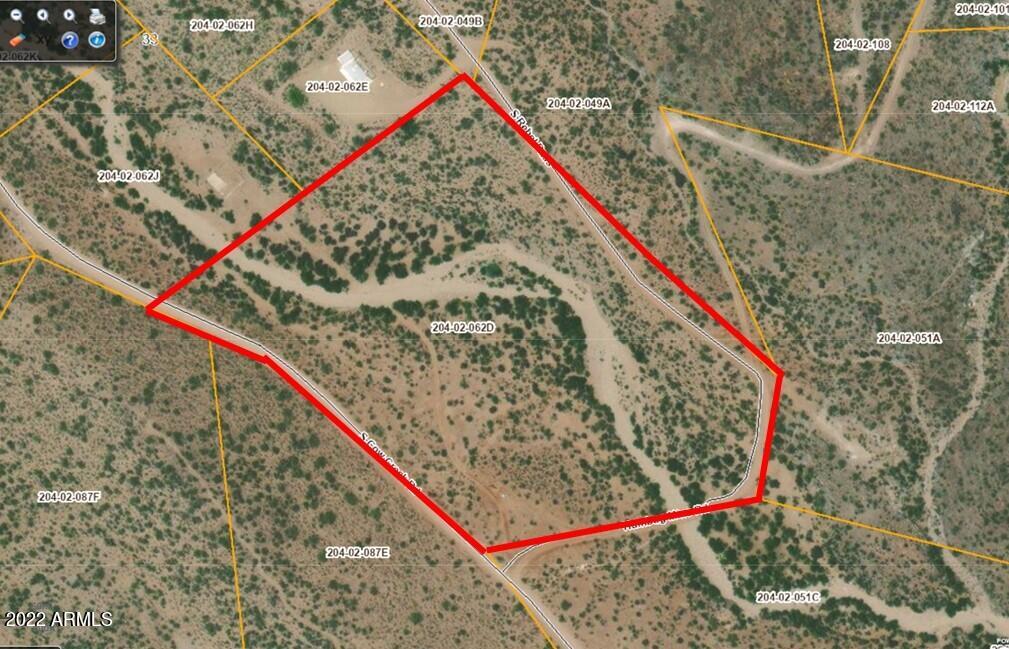 This is the best priced parcel in the entire area, bar none!  $7400 per acre with power running through the property!  You simply cannot beat that value!!!  Roads on three sides of this property and it's generally level and  buildable. Cow creek runs through this property as well insuring a great water table.