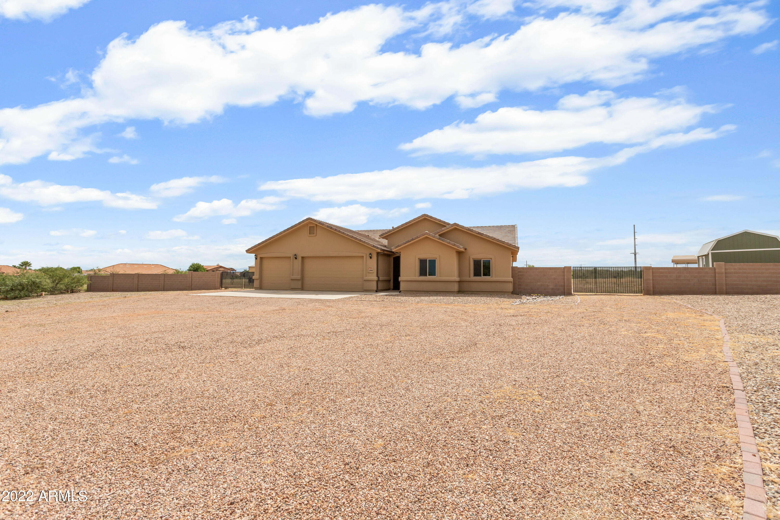 ATTENTION BUYERS- with acceptable offer Seller will credit $10,000 in concessions to buy down buyers interest rate.

This beauty has 4 bedrooms, 3 full bathrooms, 2 living/great rooms and a bonus living or den room off the kitchen. Open concept kitchen has added extended buffet area with matching cabinets, double oven gas range, pot filler and pantry. Primary suite was designed and customized with 2 closets and extra large on-suite with a walk through shower. Other bedrooms in this floor plan are split and 1 of them has it own private bathroom attached with another bathroom in the hall for other rooms and guest. Outside is 2 RV gates with RV hook up, 2 storage sheds - one was used for 'she'' shed, and additional garage/carport storage. Sitting on over 1.8 acres this has it all!