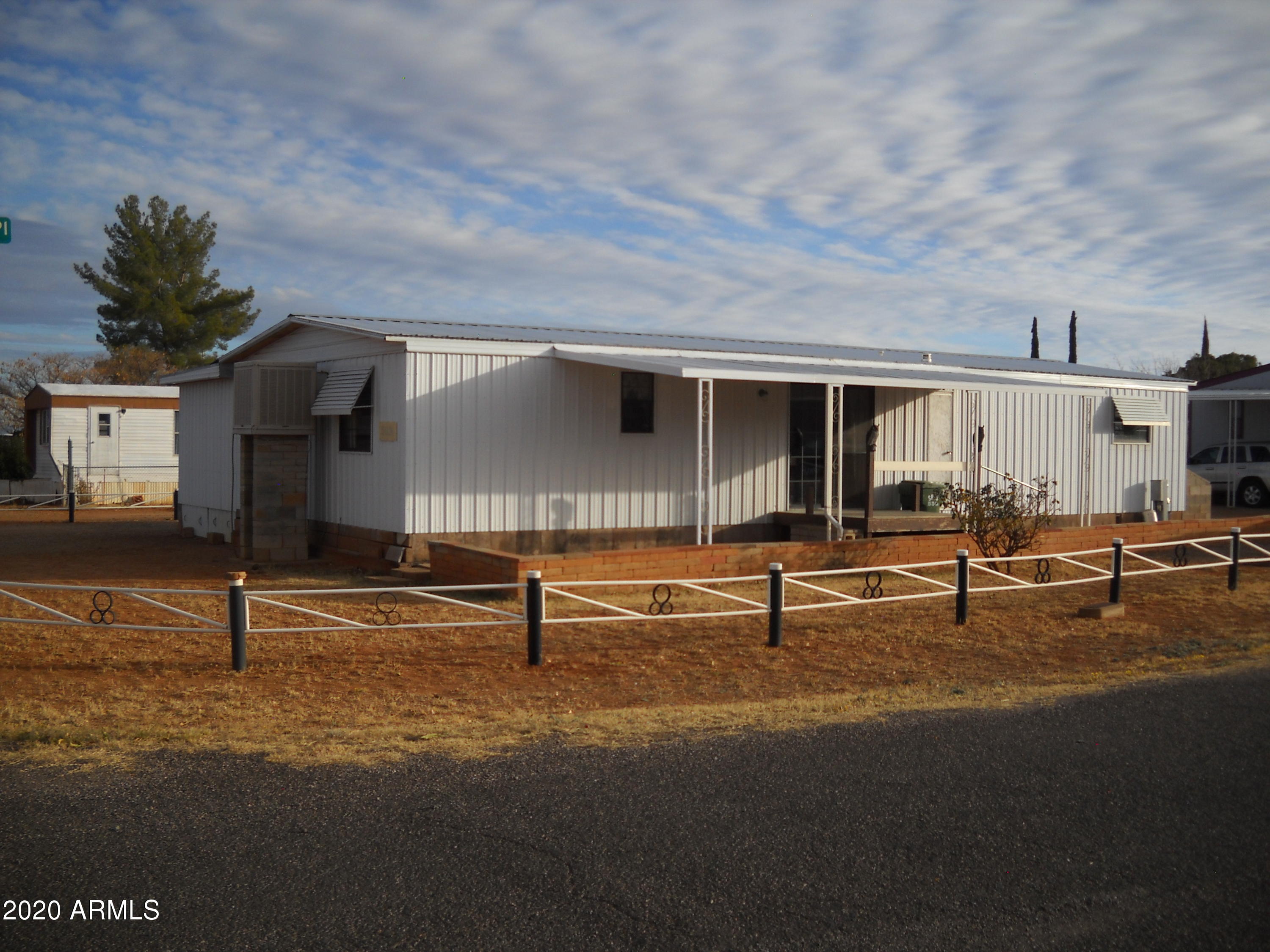 Very well maintained home in Golden Acres.   Three bedrooms, 1.5 bathrooms, eat in kitchen nice cabinets, pantry, dinning or office space spacious living room.   Double pane windows with metal ownings.  All the bedrooms have walk in closets.  Laminate floors, attached well built with shelves workshop.   Move in ready.