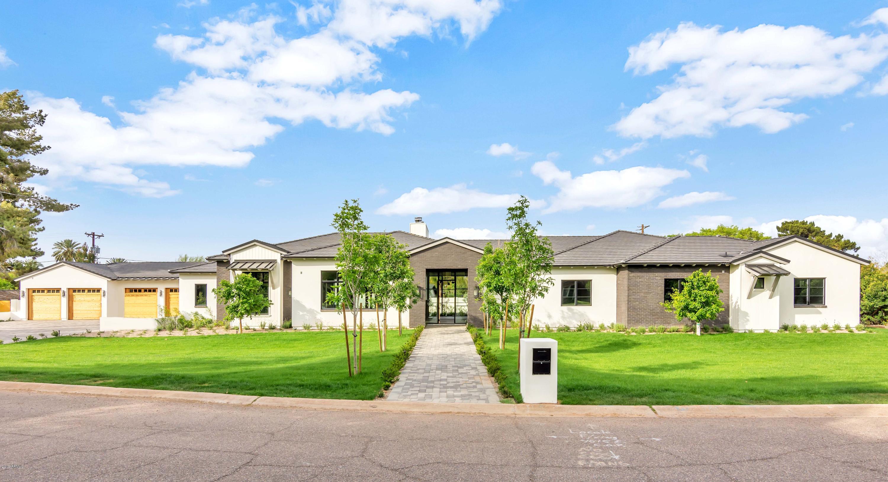 This brand new home perfectly combines contemporary and craftsman elements in a way that is rarely seen. The architectural excellence, outstanding design and artistic impression beautifully compliment one another creating truly exquisite spaces. The kitchen is fabulous, the living areas are phenomenal, all of the huge bedrooms are spectacular including an exceptional master hideaway, and every niche has its own special designer flair. The quality finishes include amazing wide plank wood flooring, modern marble, exposed wood beams and custom ceilings, chic lighting and impressive millwork. The outside is just as extraordinary with excellent curb appeal, a gorgeous pool and spa, and expansive entertaining areas for kids as well as adults. This very special residence has a fresh, natural color palette, creative building materials and an ultra serene ambience. Simply put, it's overflowing with great taste!
