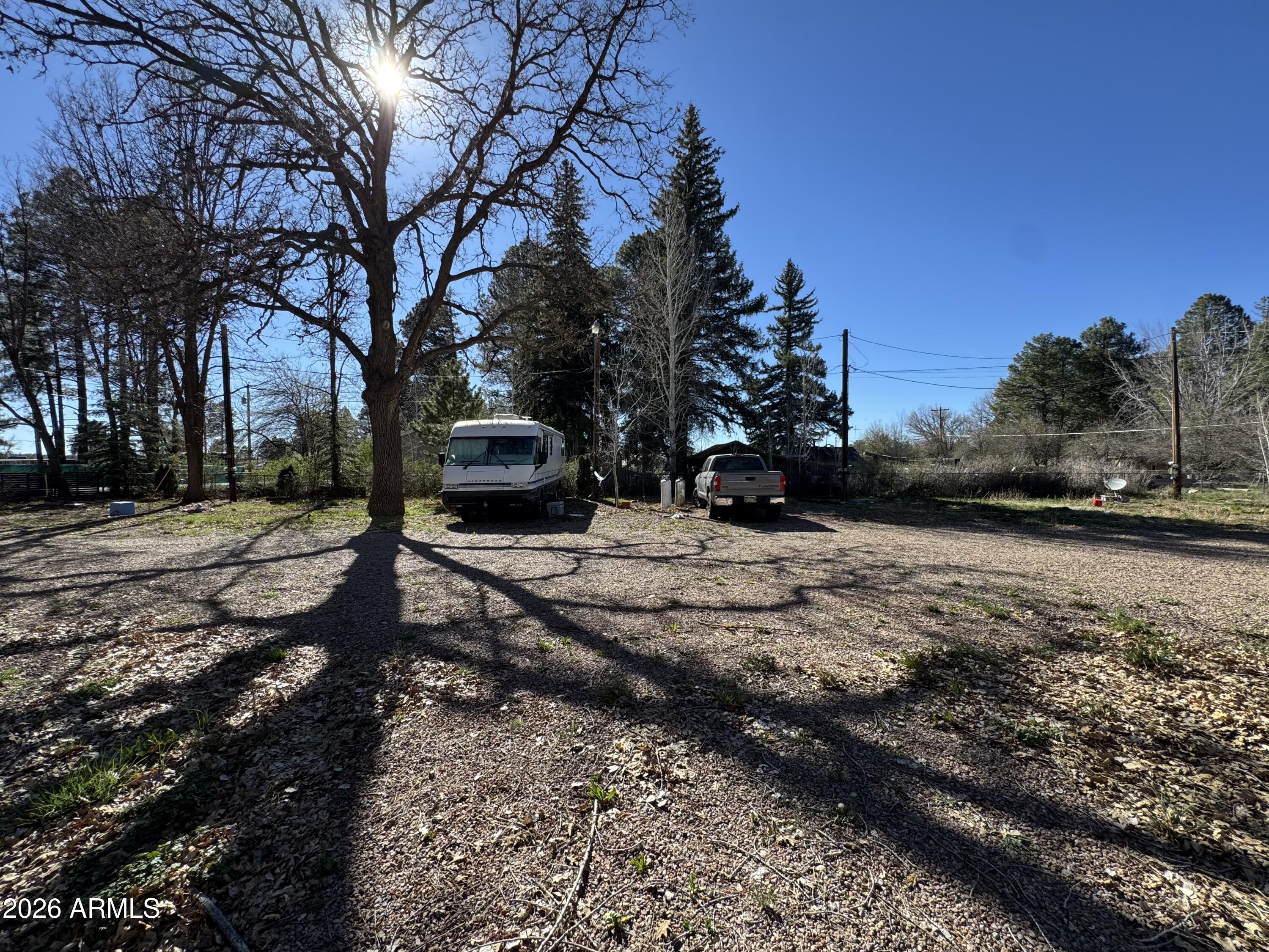 Very Unique RV Park & Small Home Compound Property - With Full Electric, Water and Sewer Hookups this Can be Used as Commercial AND/OR Residential Purposes. Building Materials and Furnishings can convey. The Three Homes are still in Final Stages of being Completely Remodeled. Professional Photos and Detailed Comments Coming Soon!
