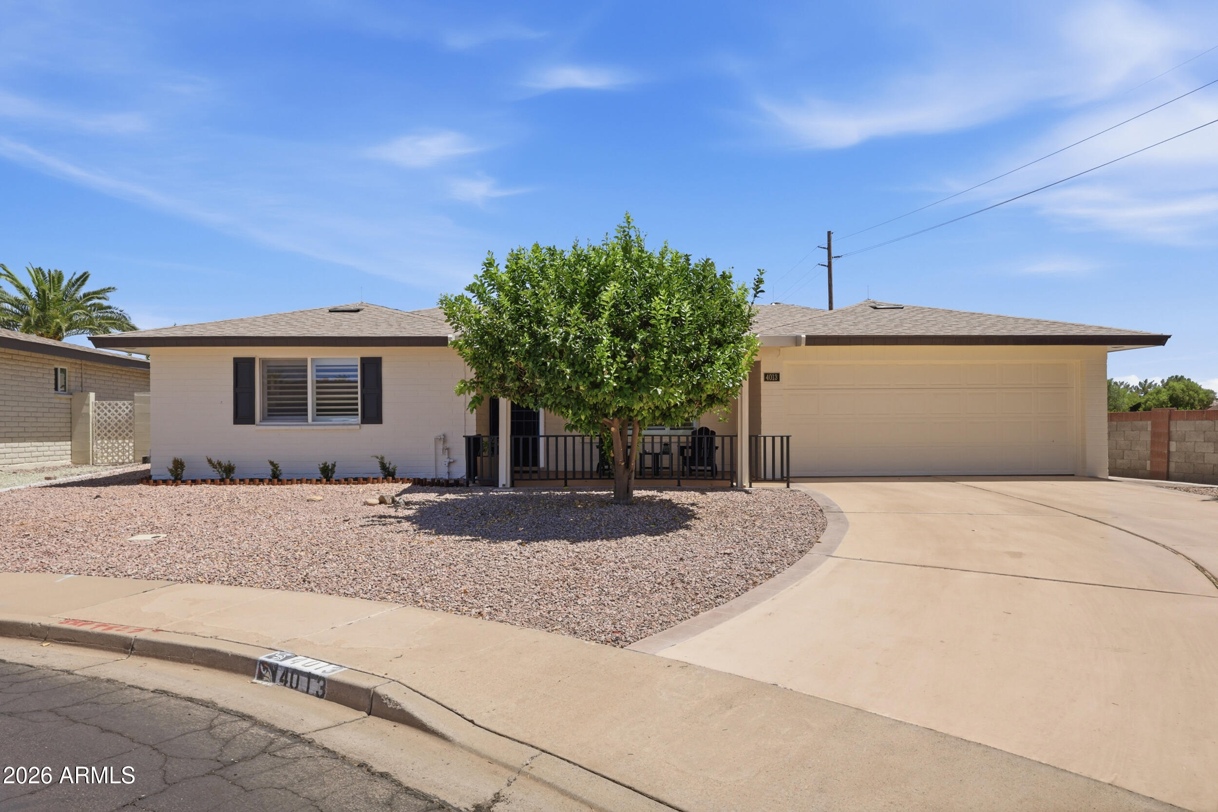Discover this fully upgraded 2-bed, 2-bath home in Sunland Village, a premier 55+ active adult community! Set on a quiet cul-de-sac, it features a 2-car garage with dedicated golf cart parking. Inside, enjoy beautiful LVP wood-like flooring throughout and dual-pane windows. The stunning kitchen features shaker-style cabinets, stone countertops, a farm sink, and all-new stainless steel appliances. Modern touches include all-new fixtures with dimmers. Relax year-round in the Bonus Room with AC! Perfectly located near Greenfield Park, offering a scenic fishing lake and walking paths. Experience the ultimate active lifestyle with access to golf, resort pools, and tennis courts right in your neighborhood. This turnkey gem is ready for you!