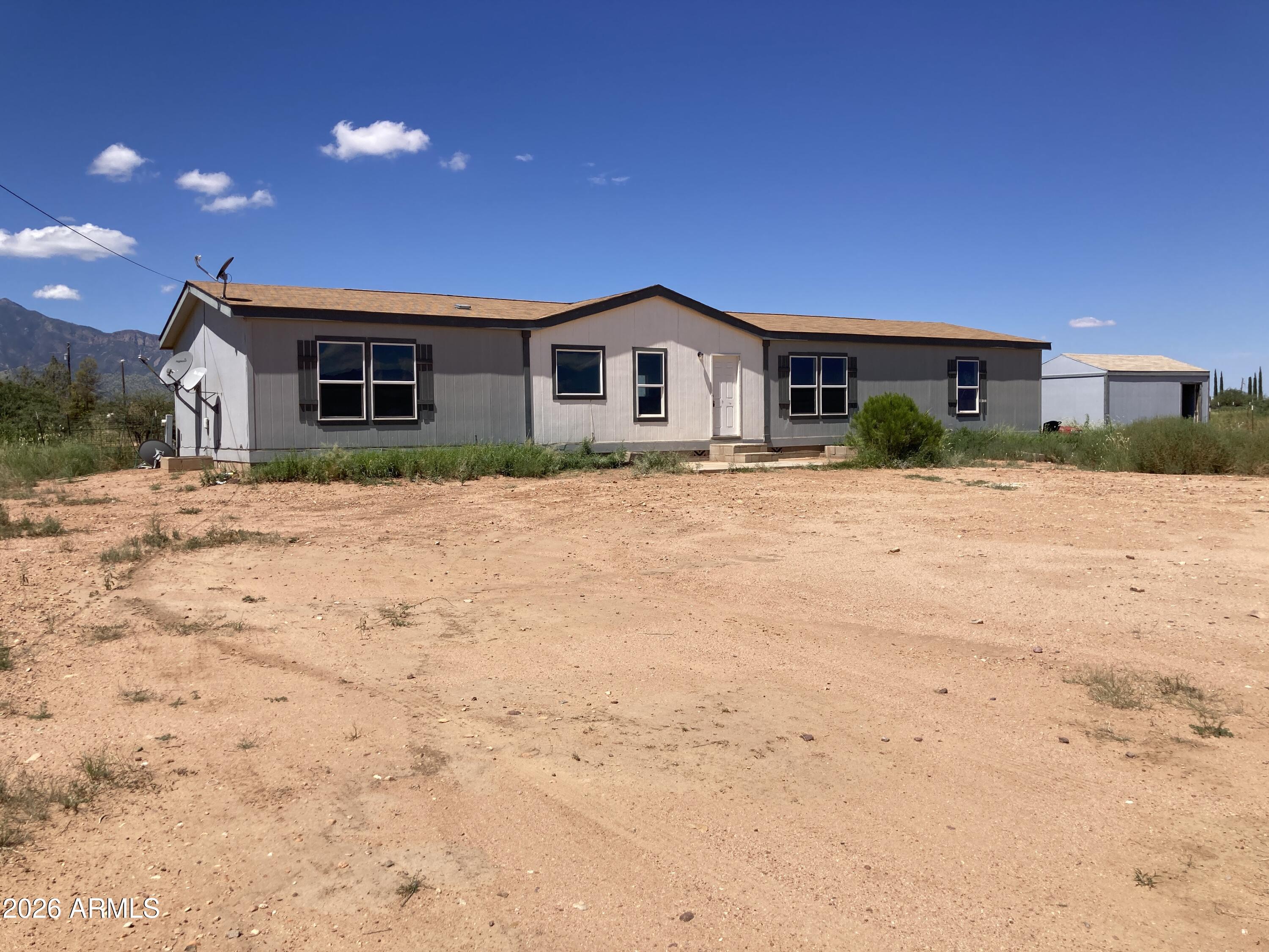 Vanella Shell - large affixed Clayton Home on 5 acres - BRAND NEW PRIVATE WELL - cosmetic fix up - totally fenced and gated. Ready for a large family or a small farm.