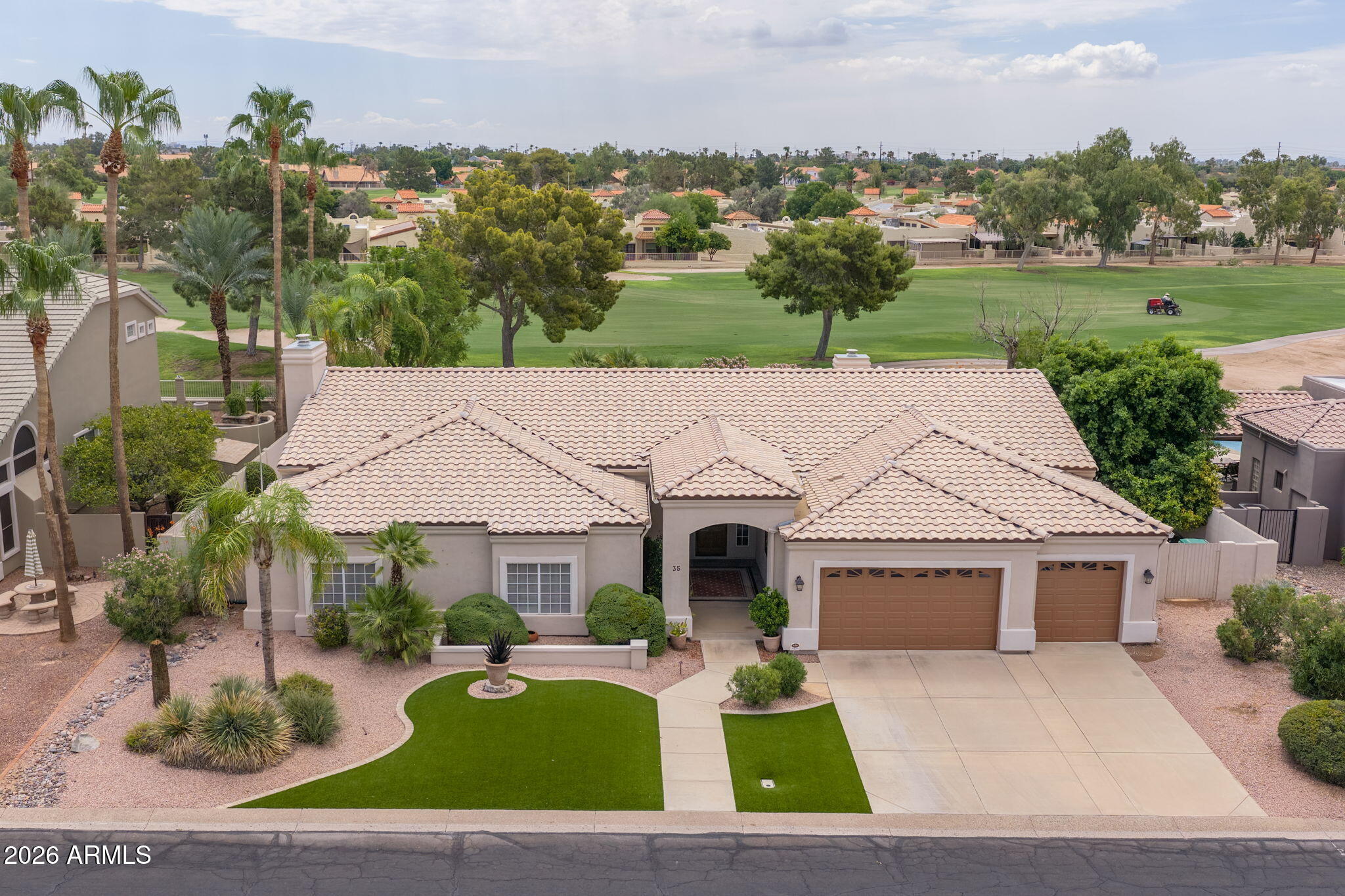 Welcome to luxury living in the prestigious gated community of Alta Mesa Estates. Situated along the 9th fairway of Alta Mesa Golf Club, this beautiful custom home offers exceptional golf course views, timeless elegance & an ideal split floor plan designed for both everyday living & entertaining. This spacious residence features 3 bedrooms plus a private office that can easily serve as a fourth bedroom, 2.5 bathrooms & an expansive primary suite w/fireplace, sitting area, patio door, walk-in closets & additional closet, spa-inspired bath w/jetted tub, oversized walk-in shower with bench & dual vanities. The gourmet kitchen showcases rich alder cabinetry, granite countertops, stainless steel appliances & a large island. Family room has custom built-ins, surround sound & a second fireplace Extensive upgrades throughout the home include designer lighting & fixtures, high end interior finishes & quality craftsmanship at every turn. Step outside to your private backyard oasis featuring a sparkling pool, built-in BBQ, chipping & putting green, roomy covered patio with TV & fans, mature landscaping, & serene golf course views - perfect for relaxing or entertaining year-round. Additional highlights include an enormous laundry room with upper & lower cabinets on both sides, a sink & even a storage closet, spacious 3-car garage with epoxy flooring, utility door & ample storage. Conveniently located near shopping, dining, top-rated schools, and freeway access, this exceptional property offers the perfect blend of luxury, comfort, and Arizona lifestyle.