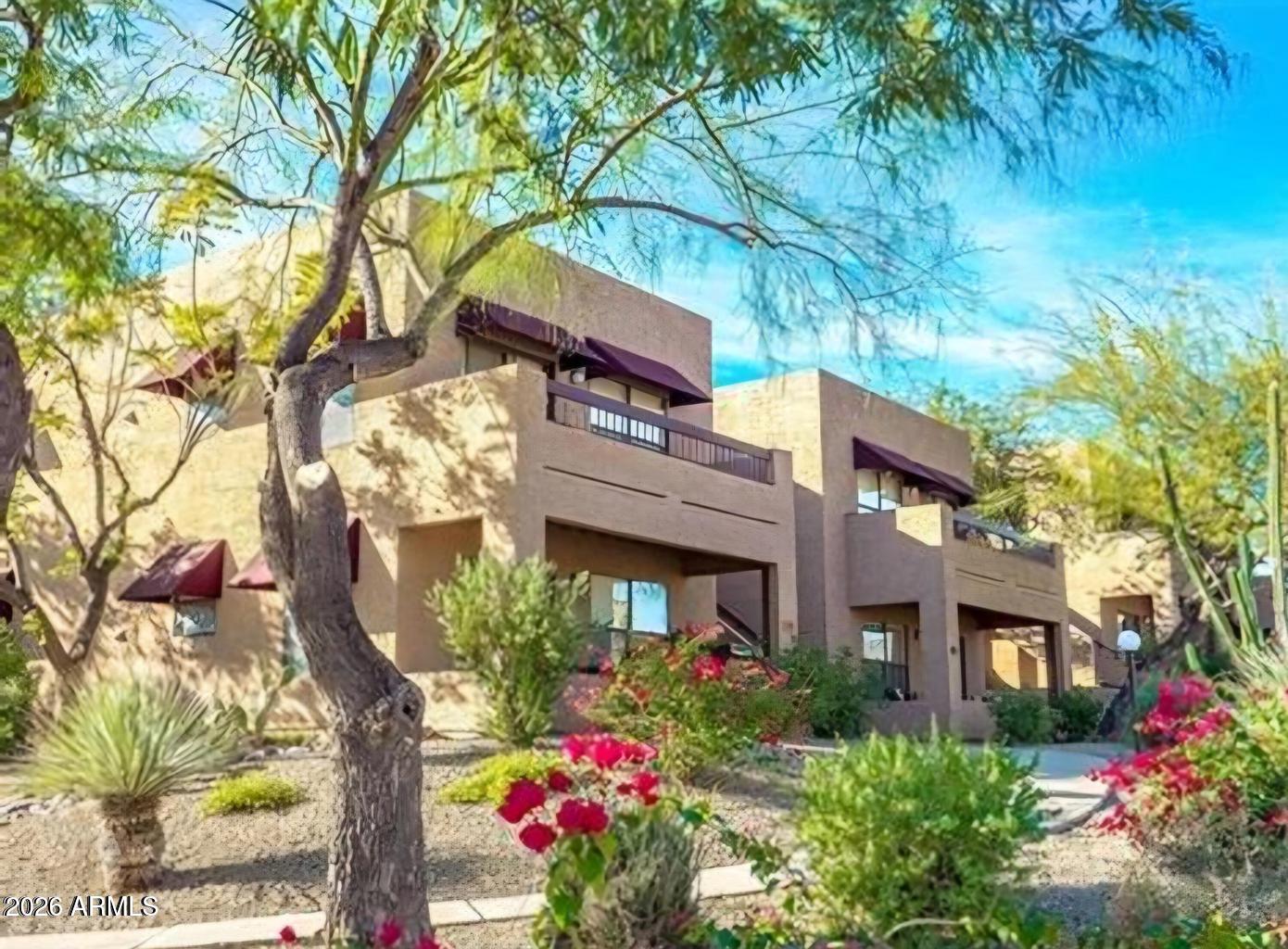 Downtown Fountain Hills One-bedroom Condo with Mountain views from a private balcony. Walk to Fountain Park, shops, and restaurants--then unwind at the community pool/spa just steps from your door. Inside, the kitchen shines with newer cabinetry, stainless steel appliances, and granite counters. The primary bath is equally upgraded with granite, vessel sink and modern fixtures. The wood-look laminate flooring is carried throughout the condo giving it a uniform spacious feel.  Convenient in-unit stacked washer/dryer. Ideal as a lock-and-leave winter retreat or an easy-income rental. Prime location in the heart of the town plus it's only approximately 30 minutes to the airport. Don't miss this chance to own in one of Arizona's most desirable communities.