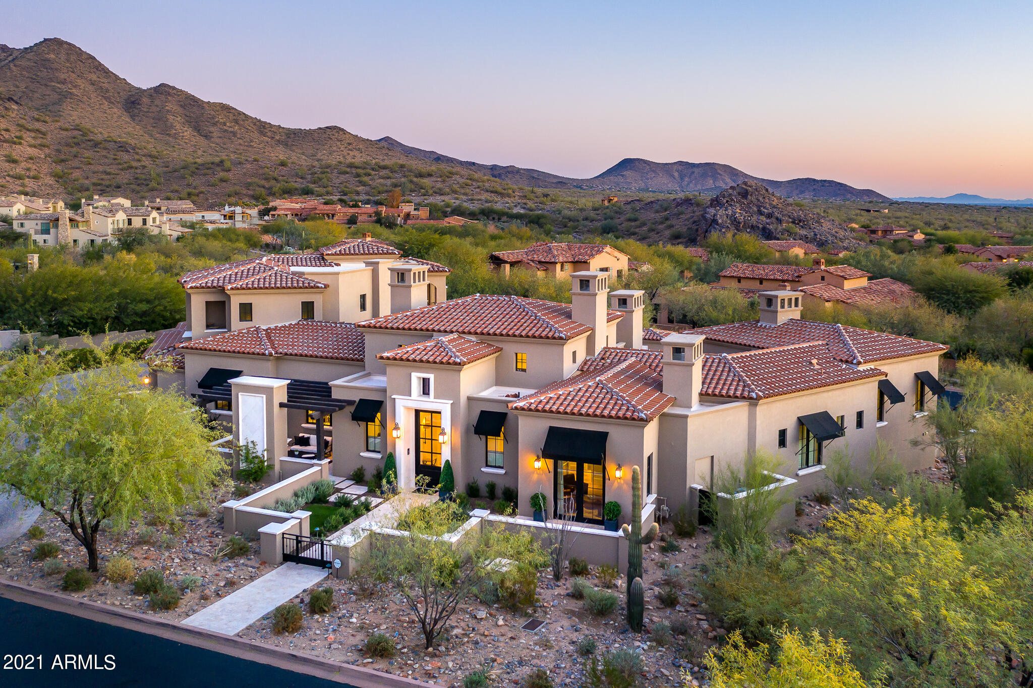 Stunning formal Mediterranean residence in Silverleaf's Horseshoe Canyon.  This recently completed home was designed by Phx Architecture and built by Desert Sky Homes. Situated just blocks from the Silverleaf Club on a beautiful tree-lined street, this home offers the best in latest design features and technology.  Extensive windows & doors capture the natural south-facing light, creating a bright and airy feel.  Flexible floorplan includes master bedroom, den, guest room and attached casita suite on the main level.  Two additional guest suites and large media room are on the second floor, surrounded by covered patio spaces with panoramic mountain and city views. Highly upgraded home features predominant wide plank wood flooring,  marble and stone counter tops, Wolf kitchen appliance package, temperature controlled wine closet, whole home automation and A/v system, built in ceiling patio heaters, automated shade system, and large sliding doors in great room which connect seamlessly to the backyard and pool.  A beautiful bar area with BBQ center connects via retractable windows to kitchen, while capturing the ambience of the adjacent pool, spa and extensive covered patio space.  A remarkable property on one of Silverleaf's most coveted streets!