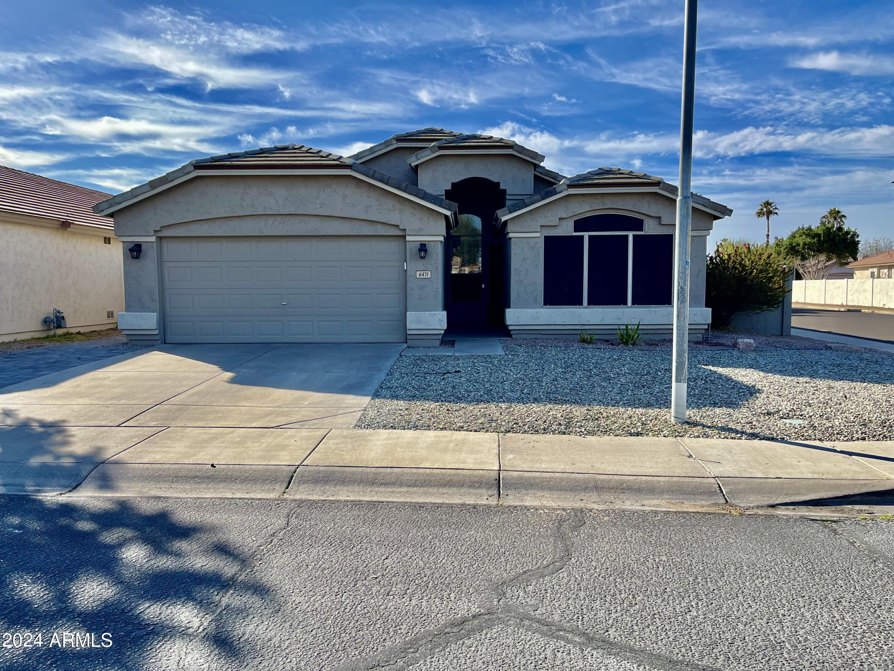BEAUTIFUL CORNER LOT HOME! Welcome to the highly sought after Highlands in Arrowhead Ranch! Home features upgraded backyard, hardwood flooring, tile in kitchen and bathrooms and laundry room, laminate flooring in bedrooms, wooden shutters and blinds, vaulted ceilings, spacious kitchen with stainless steel appliances, kitchen island, pantry and breakfast bar. Large pebble Tech pool, artificial turf, extended patio in backyard. Just in time for summer! Paver walkway in front of home. Other recent updates - new roof and E/W windows in 2022, new A/C 2024. Home is well maintained. TENANT TO VERIFY ALL INFORMATION. 
Tenant occupied. Lease to start no earlier than July 1st. *Weekly Pool chemical service included!* Owner/Agent. This home will rent quickly!