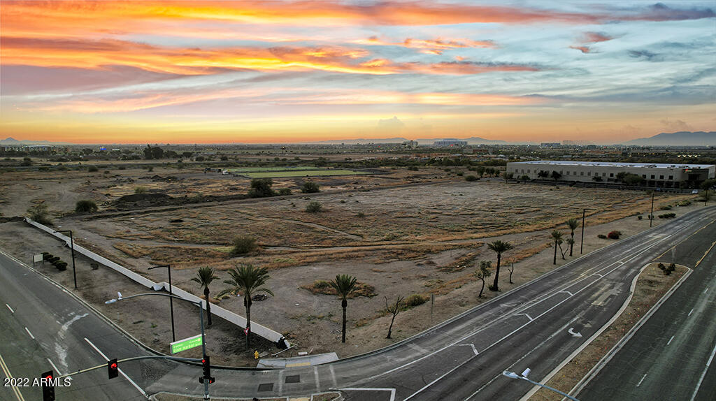 ZONED M1 with PREMIUM VISIBILITY/ACCESSIBILITY FROM the UPCOMING NORTHERN PARKWAY INTERCHANGE PROVIDING EASE OF ACCESS TO THE LOOP 303, LOOP 101, AND US 60. *See additional docs tab. THIS IS A ONE-OF-A-KIND OPPORTUNITY that possesses excellent visibility from NORTHERN PARKWAY and also has substantial frontage on GLEN HARBOR. The site will have two (2) separate access points located at Northern Avenue and Glen Harbor and is in close proximity to Westgate, Gila River Arena, and the University of Phoenix Stadium which is home to the SUPER BOWL 2023. We have premium placement and access and are pleased to bring THE BEST OPPORTUNITY TO MARKET.  In the event you or your client should be in need of a general contractor or developer, please inquire. *See remarks tab for more information.