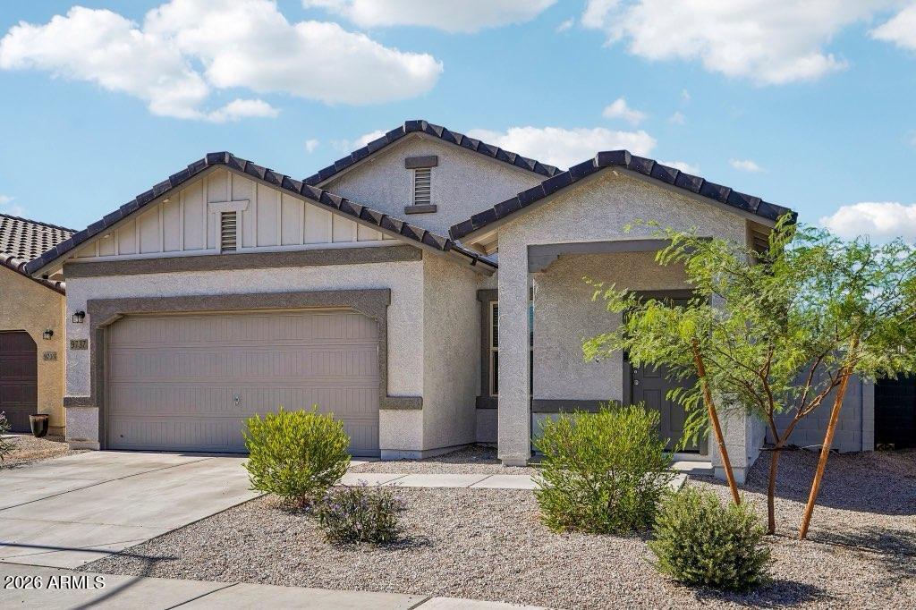 Move-in ready and better than brand new! This beautifully upgraded home offers stunning mountain views and a professionally finished backyard featuring a pergola, shade structure, low-maintenance synthetic turf, and a dedicated garden area. Inside, you'll find 9' ceilings, Shaw 17'' x 17'' tile flooring, granite countertops, white shaker cabinets, Low-E dual-pane windows, and a Wi-Fi programmable thermostat. Blinds and refrigerator are already installed, making this home truly turnkey. The 2-car garage includes an epoxy-coated floor and overhead storage. Located near a greenbelt, premium neighborhood park, and playground with convenient access to Loop 202, I-10, and Loop 101. Includes a 1-year home warranty, completed home inspection report, and a 1% Flex Credit through the preferred lende