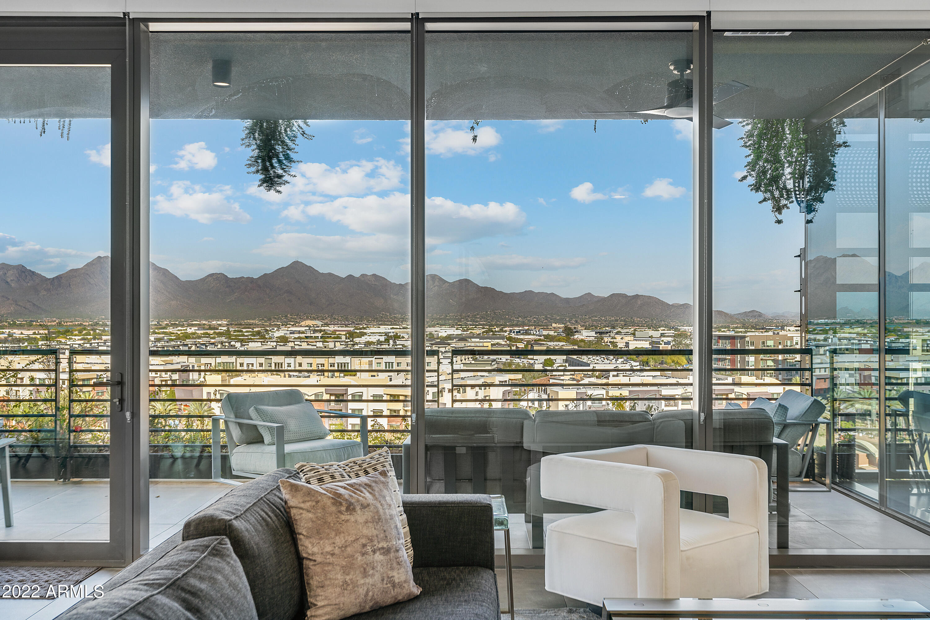 Step into your beautiful new home at the Optima Kierland Tower! One of the only units with 3 bedrooms & 3 bathrooms, this Penthouse location has views from room!  Floor to Ceiling Windows & Sliding Glass Wall open to a large private patio! With 2018 square feet of living space, this spacious floor showcases a sleek design that combines the kitchen, living & dining spaces seamlessly for the ultimate open concept living. Optima amenities include heated pool, sport court, gated entry, 2 assigned parking spaces, as well as close proximity to Kierland Shops, Dining and Lifestyle!