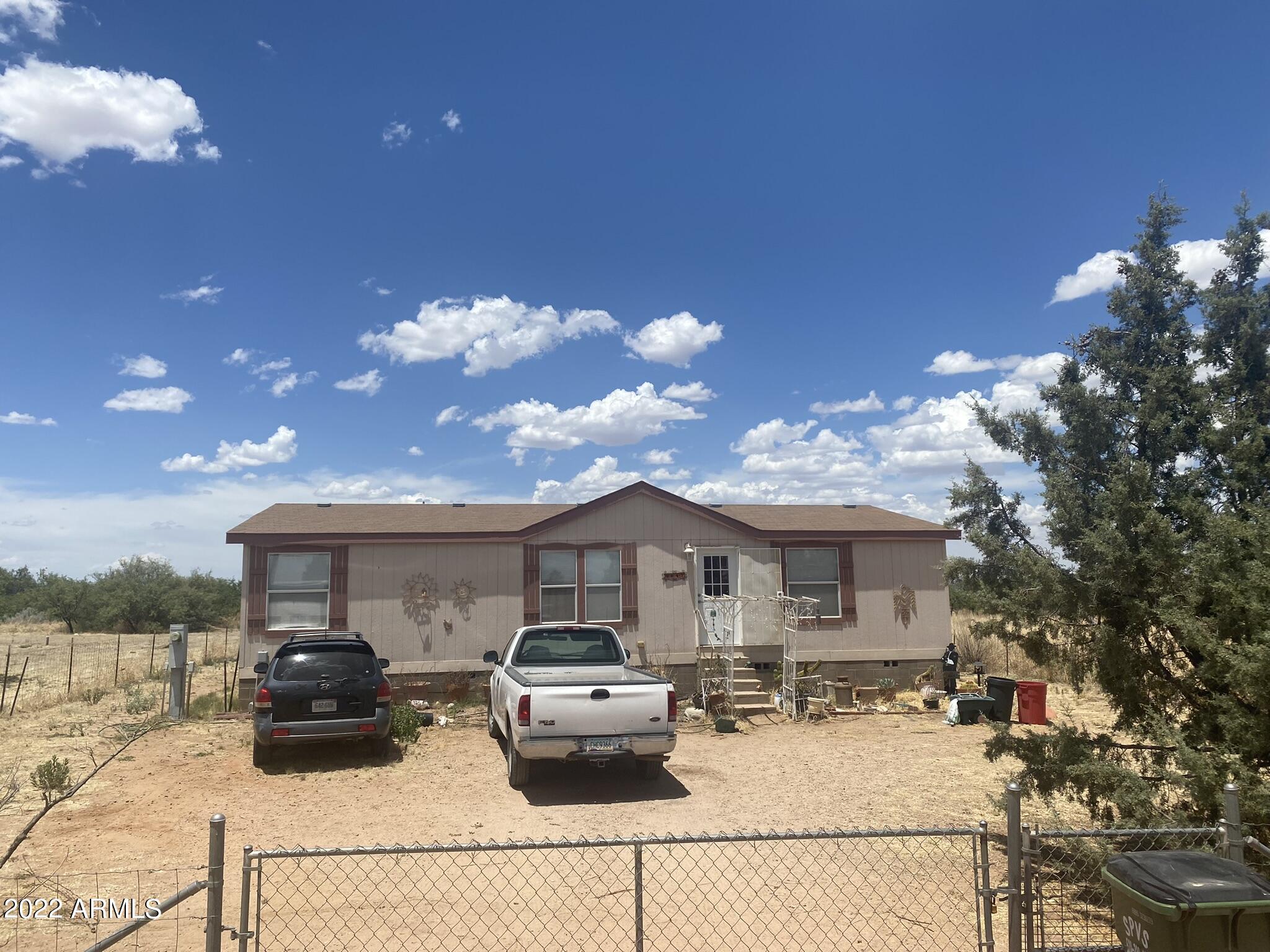 BACK ON THE MARKET NO FAULT OF THE HOME-

Private water well, over 1/2 an acre fully fenced horse property with 2 sheds that borders vacant land with beautiful mountain views!

Interior offers large kitchen, laundry room with exterior access, oversized bedrooms, big closets and so much more!!!
All this for only $155,000!!!