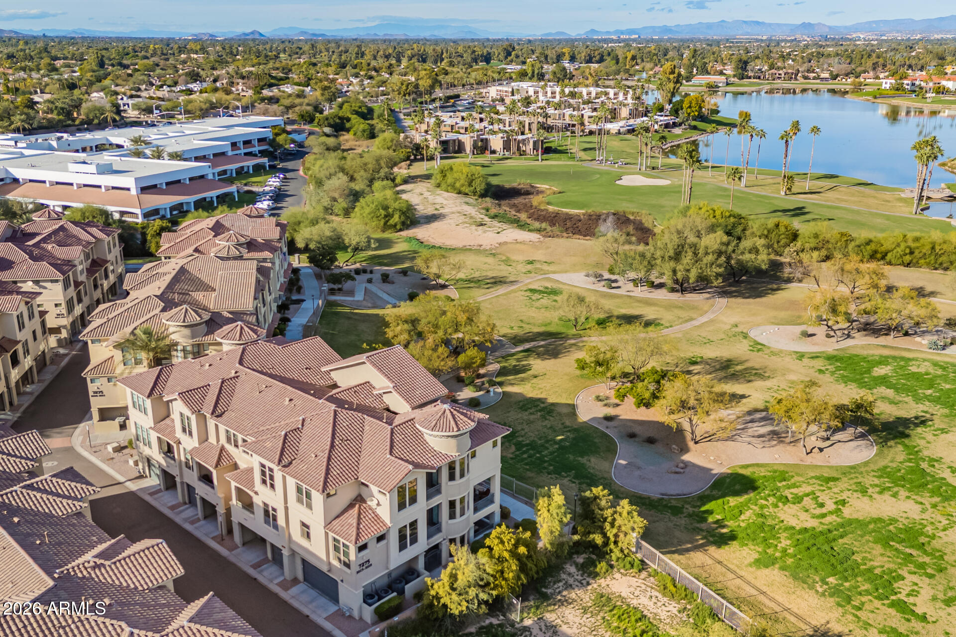 COME AND GET YOUR NEW HOME!! This exceptional three-level residence delivers refined luxury living with unobstructed golf course & mountain views that create a striking sense of openness & privacy. Light-filled interiors are enhanced by travertine flooring, multiple balconies, & a private elevator that provides seamless access to each level. Thoughtfully designed for both everyday comfort & elevated entertaining, the gourmet kitchen features Viking appliances, gas cooking, a generous island, & designer finishes throughout, all integrated with a Crestron smart home system for effortless control. Flexible floor plan includes four bedrooms & three and a half baths, highlighted by a first-floor guest suite with its own private entrance &full bath-ideal for visitors or multigenerational living The primary suite is a true retreat, offering blackout shades, a private balcony, dual closets, and distinctive custom leather flooring. A two-car garage with EV charging adds modern convenience, while gated front door access and a secure community setting provide peace of mind. Located within the prestigious Artesia community, residents enjoy access to a resort-style pool, spa, fitness center, ramadas, and a sprawling ten-acre park adjacent to McCormick Ranch Golf Club. The setting is unmatched, with McCormick Train Park just across the street and the ability to walk to dining and shopping. Perfectly positioned in the heart of Paradise Valley and Scottsdale, this home offers immediate access to freeways, premier shopping, renowned restaurants, and year-round eventsan extraordinary opportunity to experience luxury living in one of the area's most coveted locations.